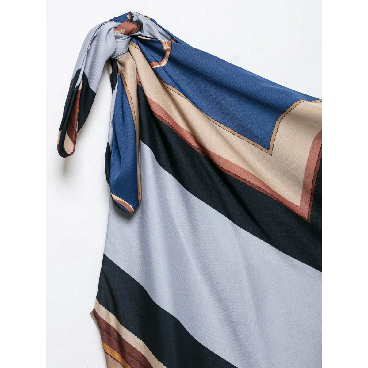 Close-up of shoulder tie knot and scarf print