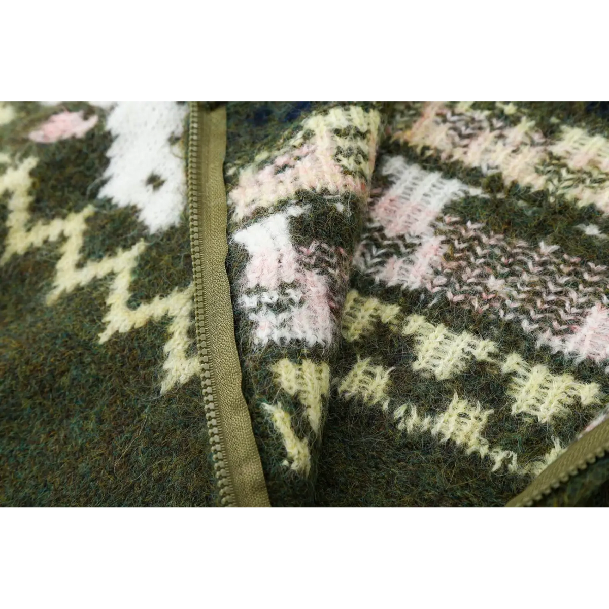 Close-up of inside zipper tape and reverse knit pattern