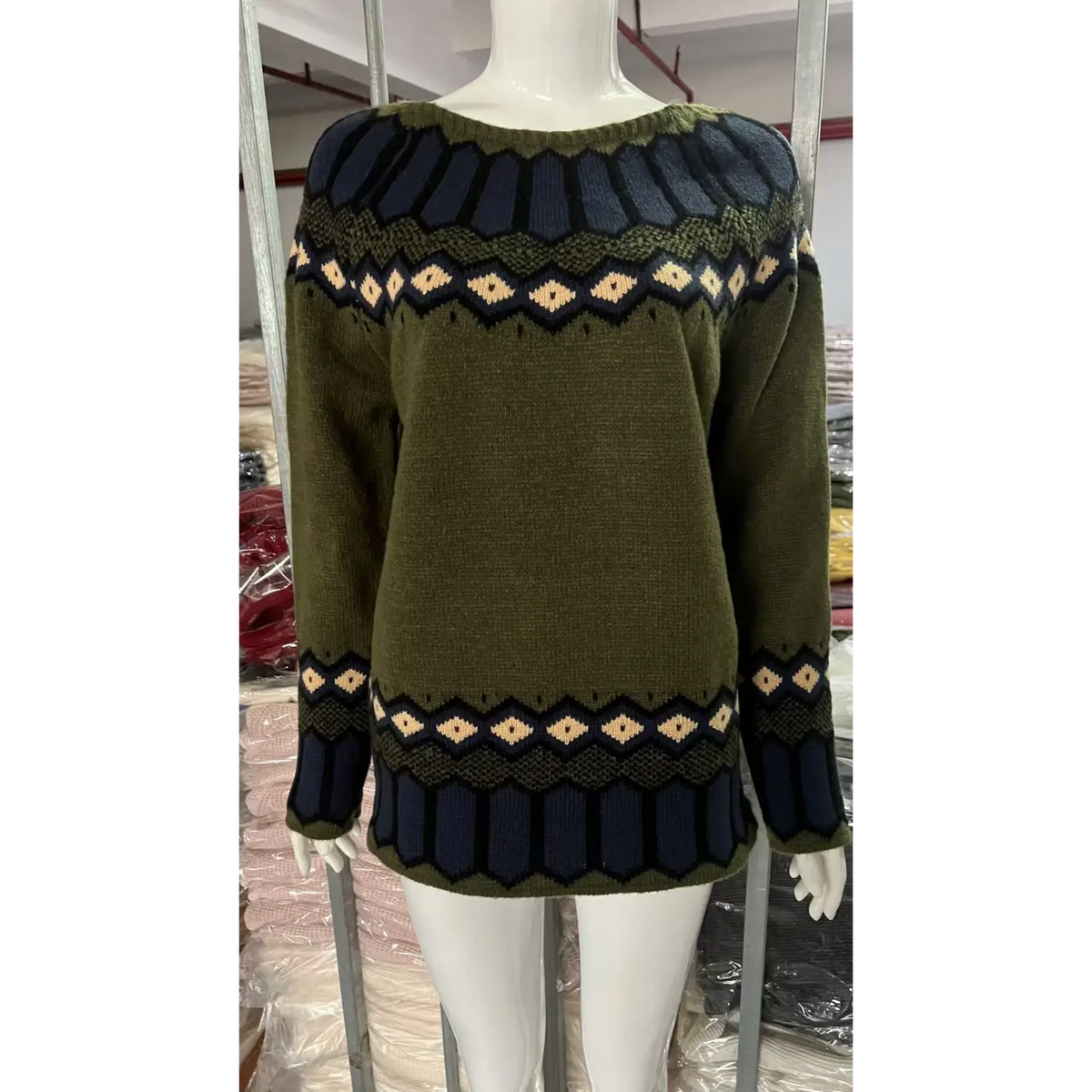 Front view of fair isle yoke hem striped knit sweater on mannequin