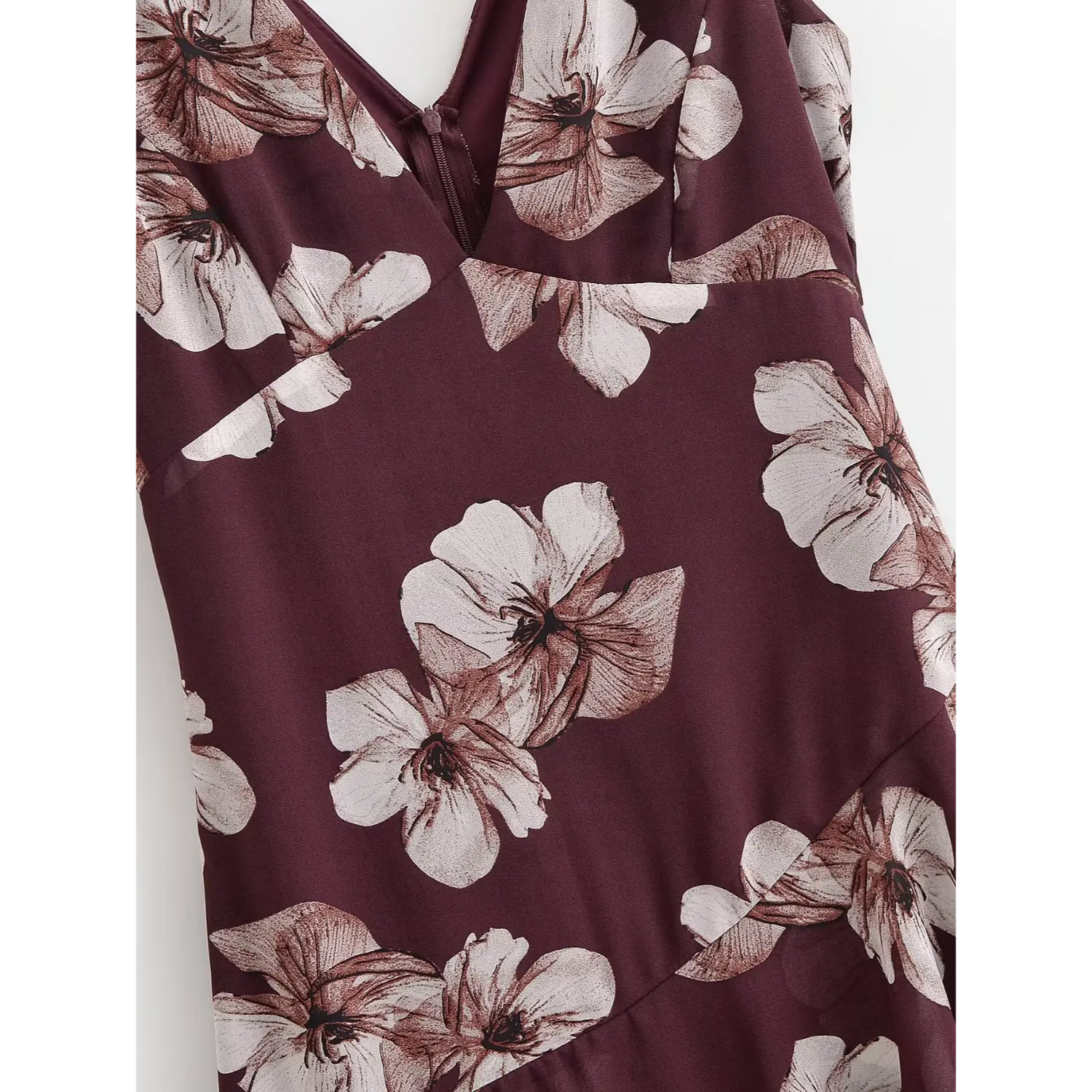 Closeup waist shaping seams & vintage off-white flower print on burgundy chiffon