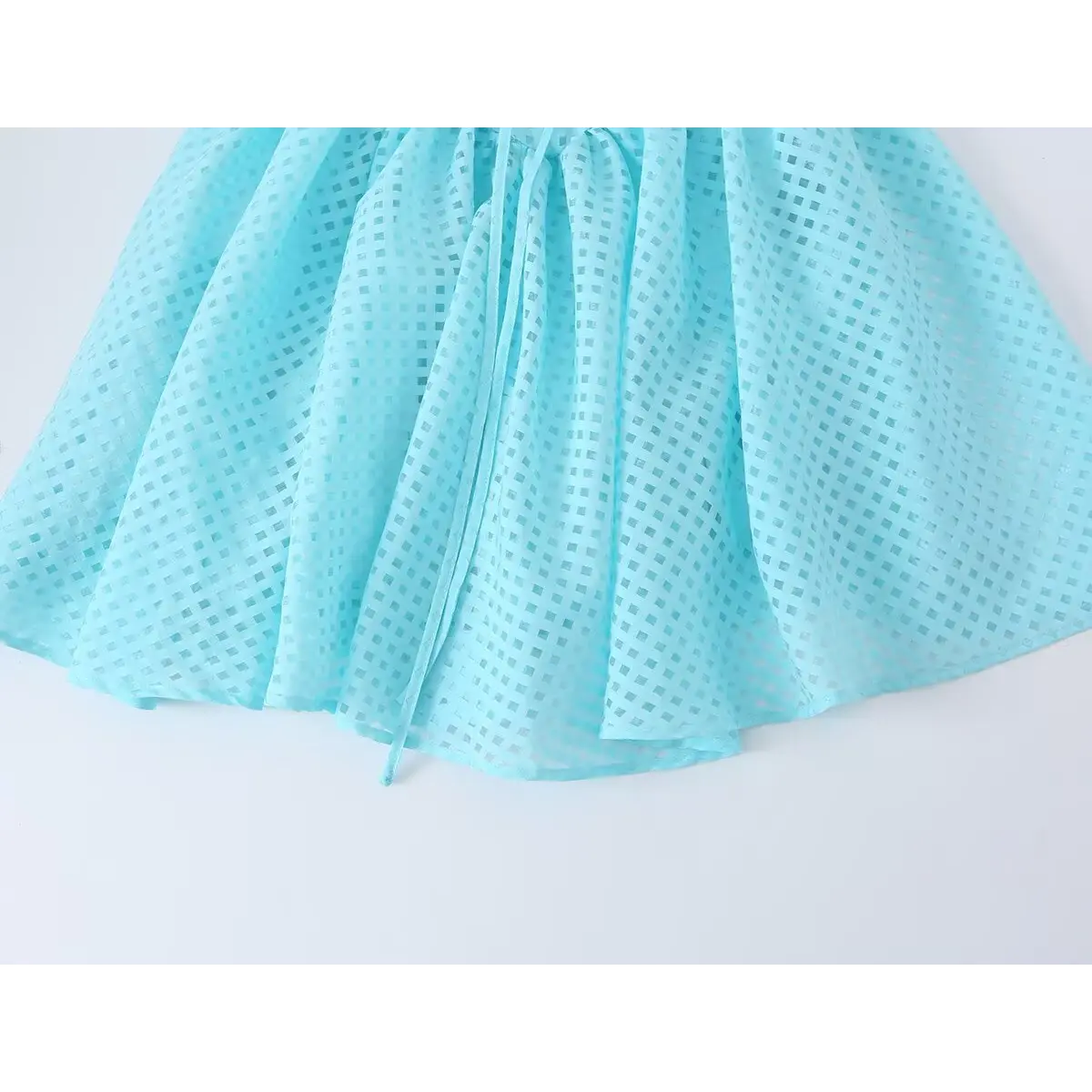 Ruffled flare skirt hem semi-sheer jacquard fabric detail