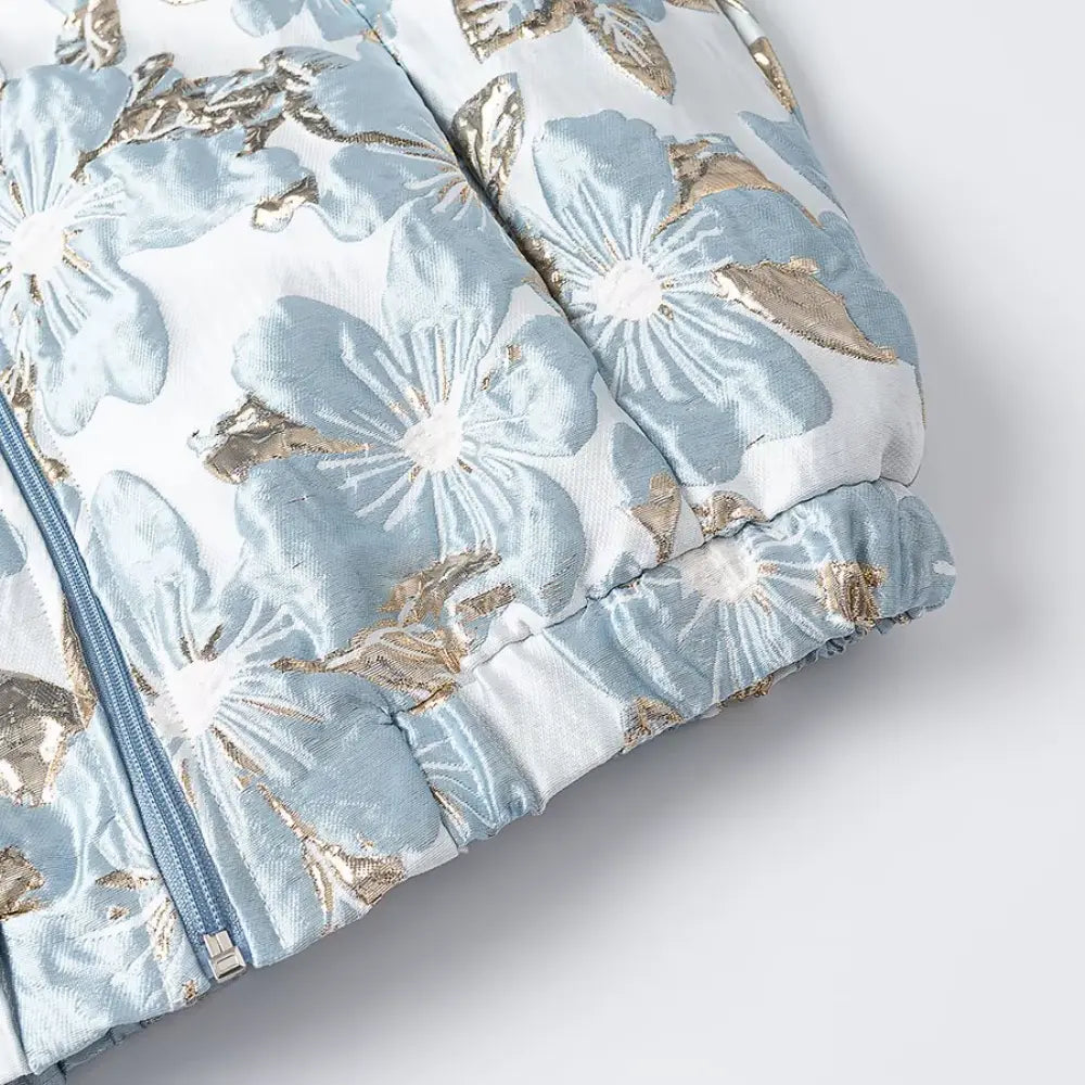 Close-up of elasticated hem and floral brocade