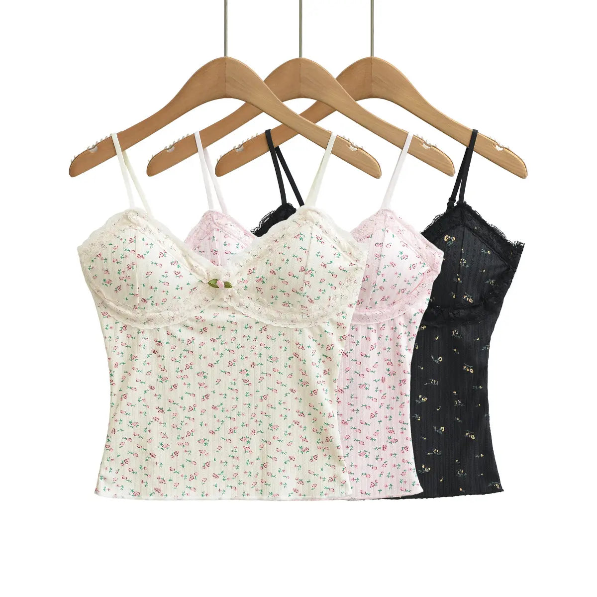 Collage of floral cami tops in cream, pink, and black, showing different color variations of the same design.

