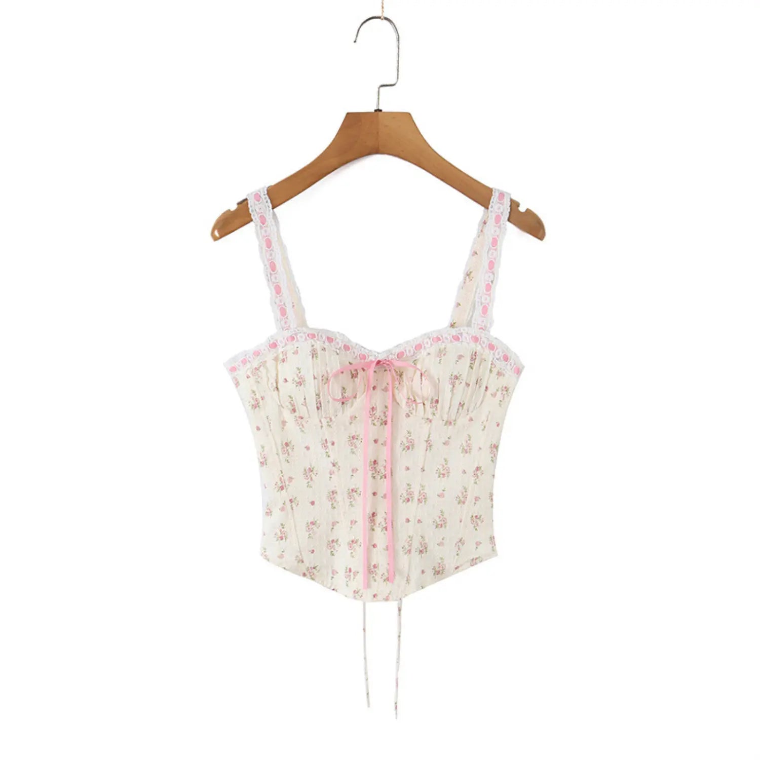 Style view on white background of the floral print corset-style camisole top, front with pink ribbon bow