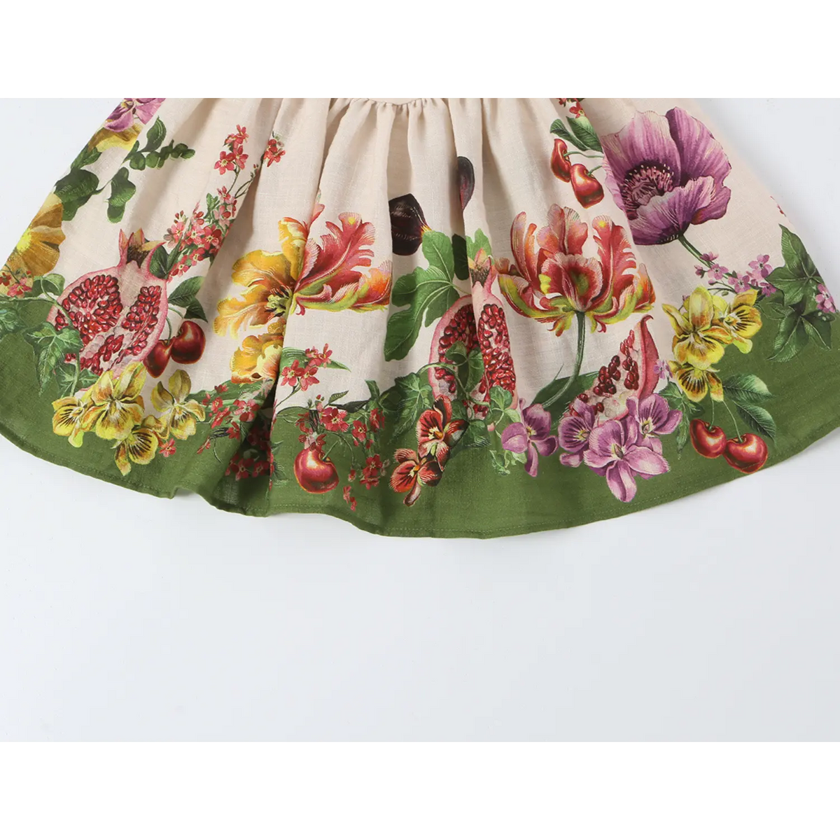 Close-up of skirt print and green border hem
