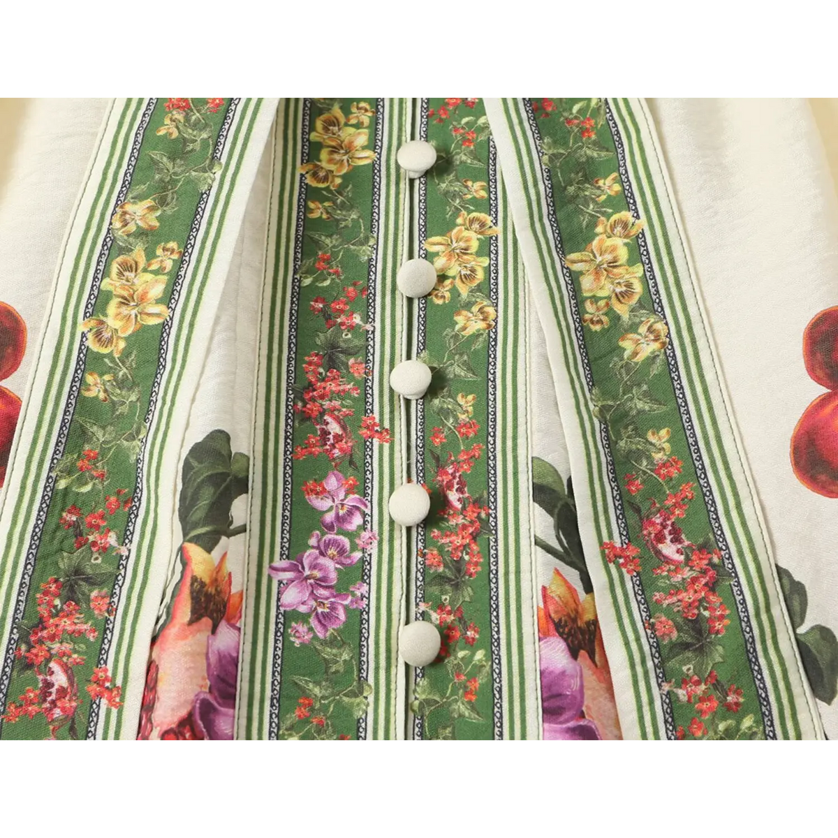 Close-up of matching buttons and green trim