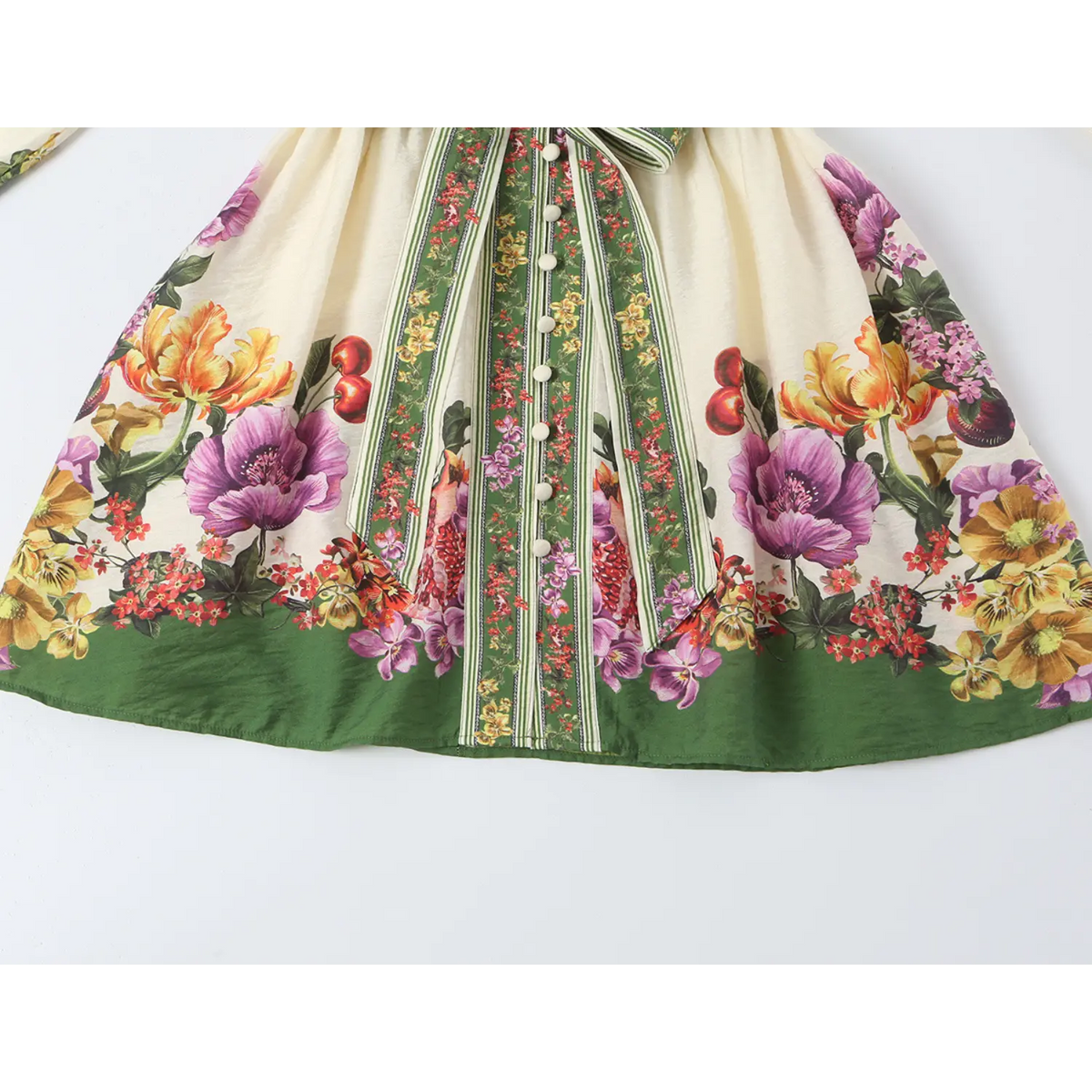 Close-up of skirt print and green border hem