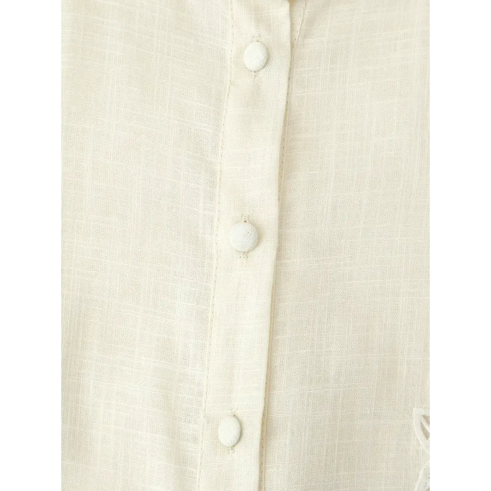 Close-up of front placket covered buttons