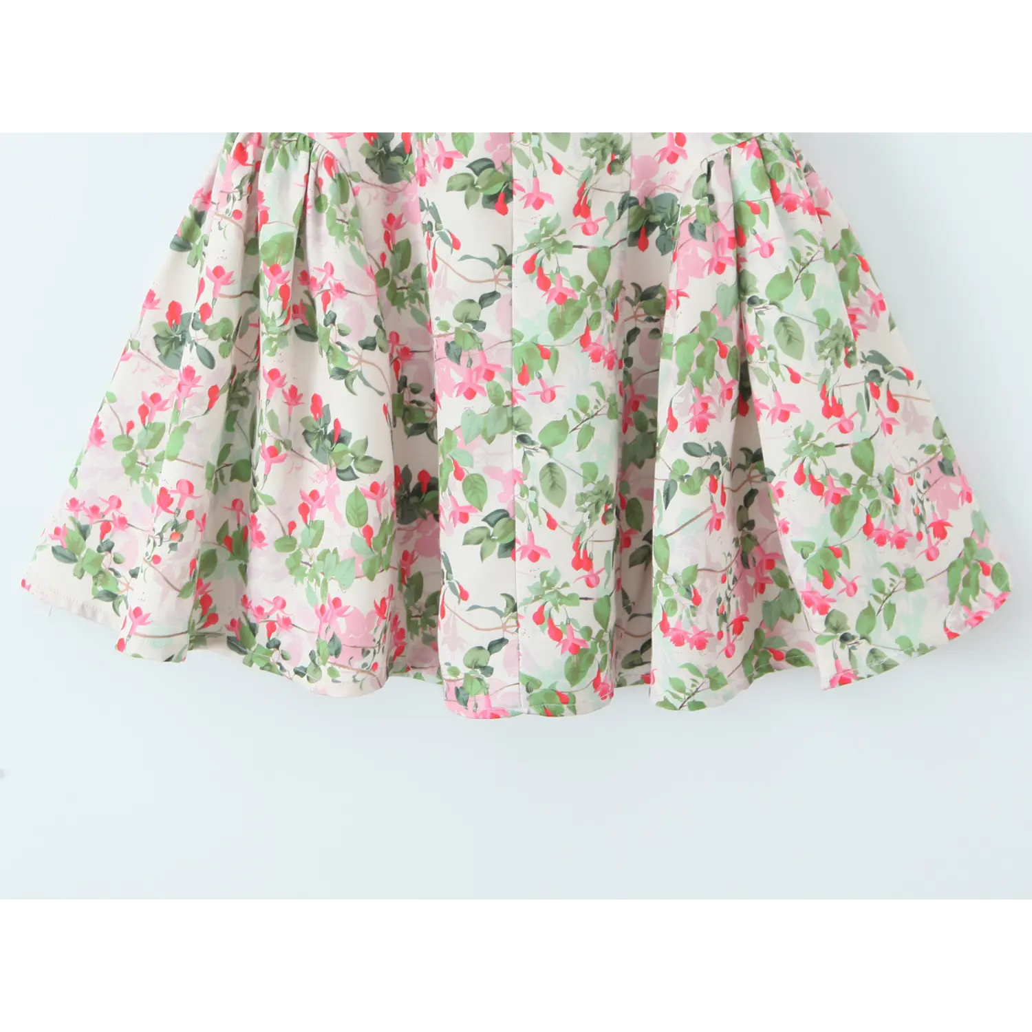 Lower skirt full panel, dense uniform waist gathering, multi-panel flared skater hem, bouncy swing silhouette