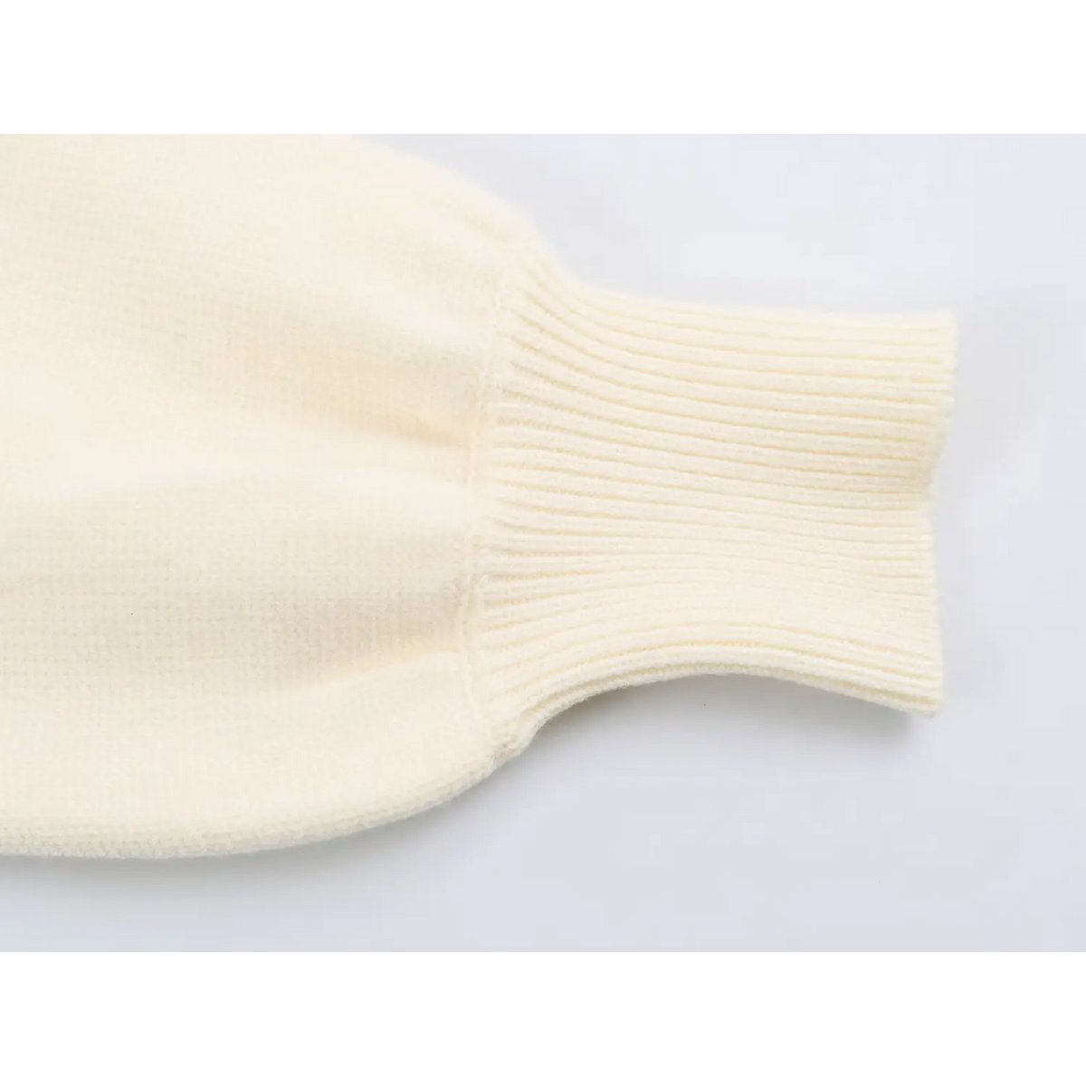 Close-up of ribbed balloon sleeve cuff