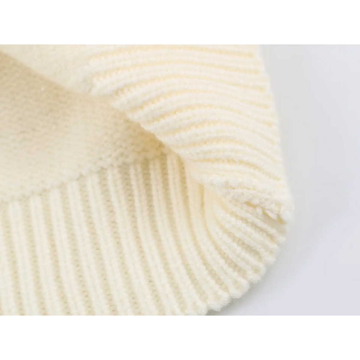 Close-up of folded ribbed hem texture
