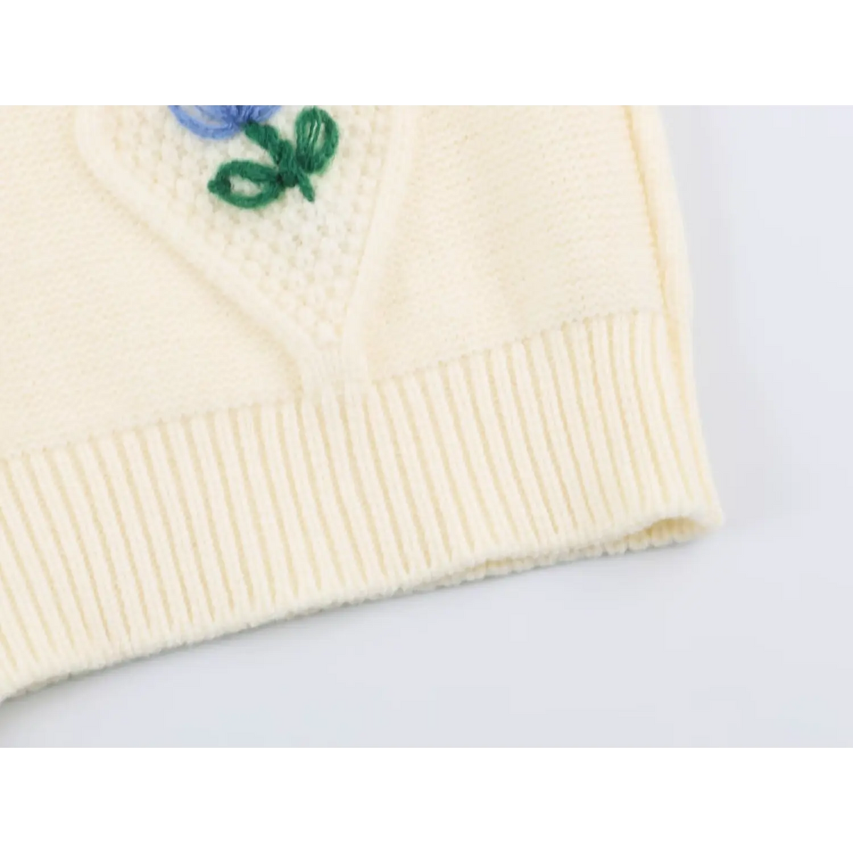 Close-up of ribbed hem and side seam
