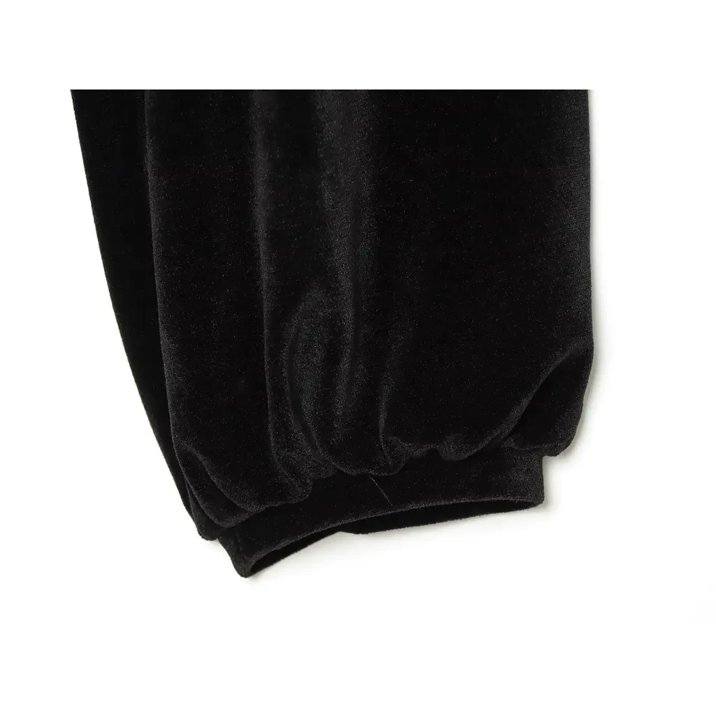 Close-up of gathered velvet cuff