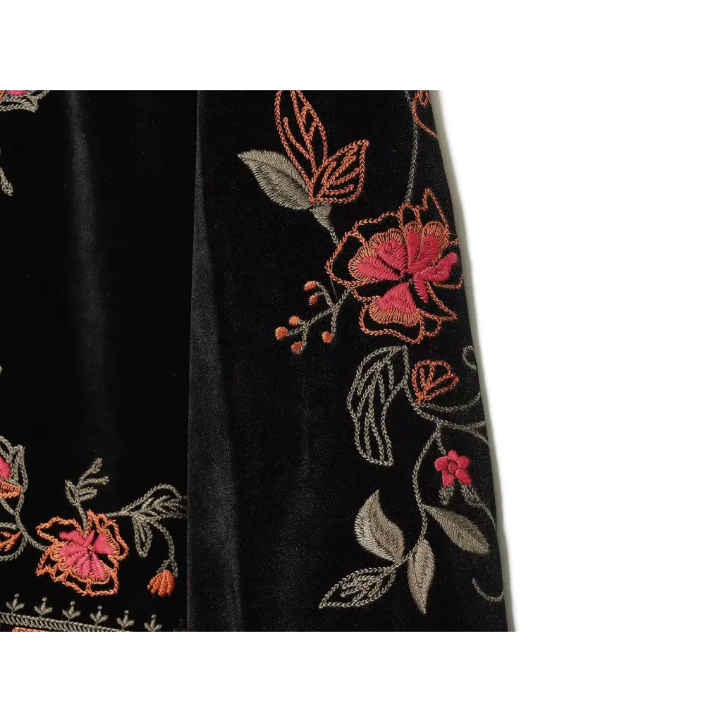 Close-up of sleeve floral embroidery detail