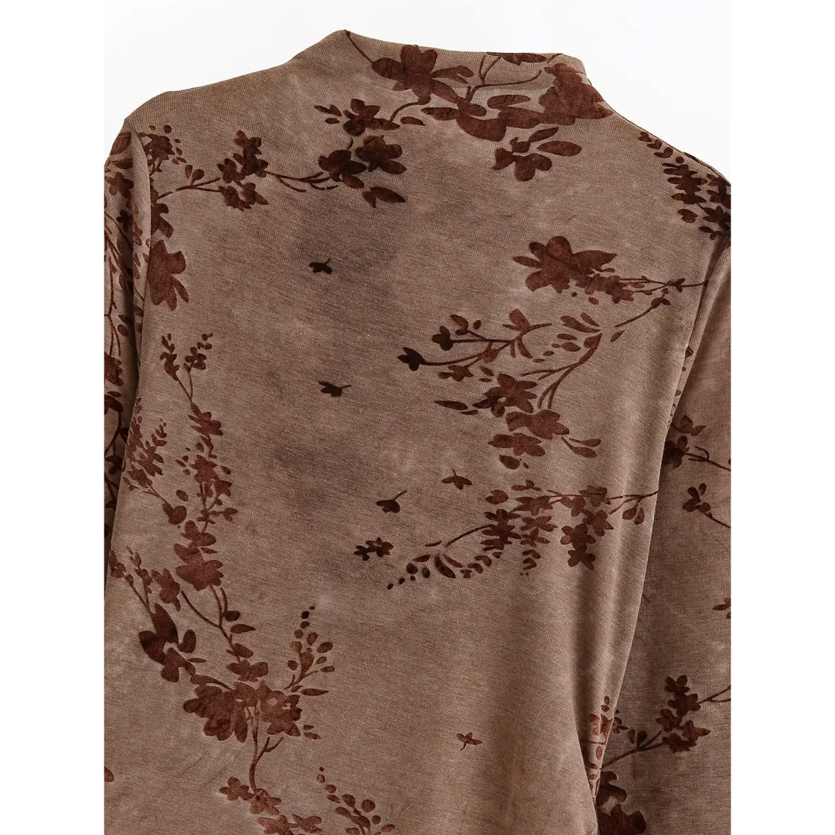 Close-up of back shoulder and flocked floral