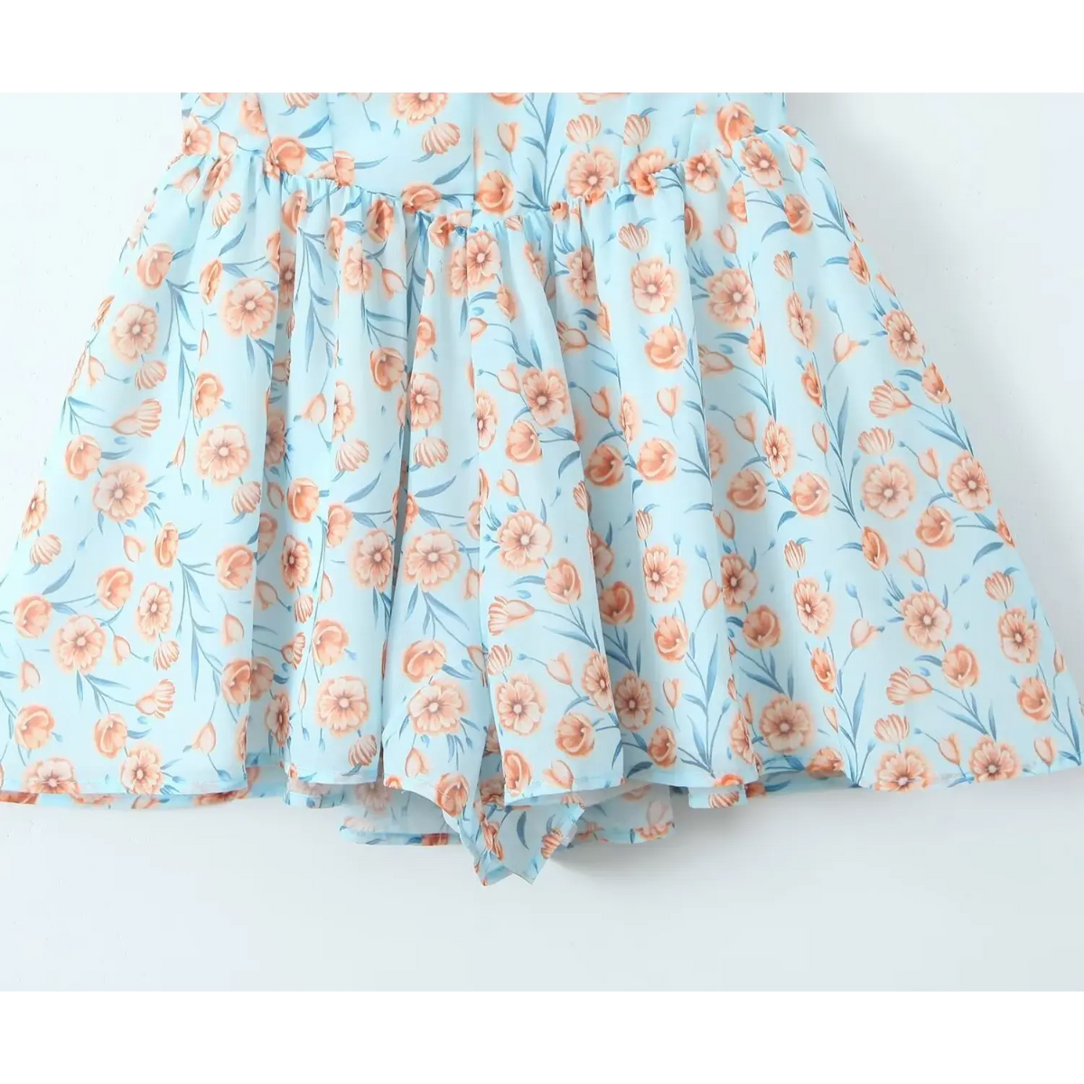 Close-up of ruffled mini skirt hem