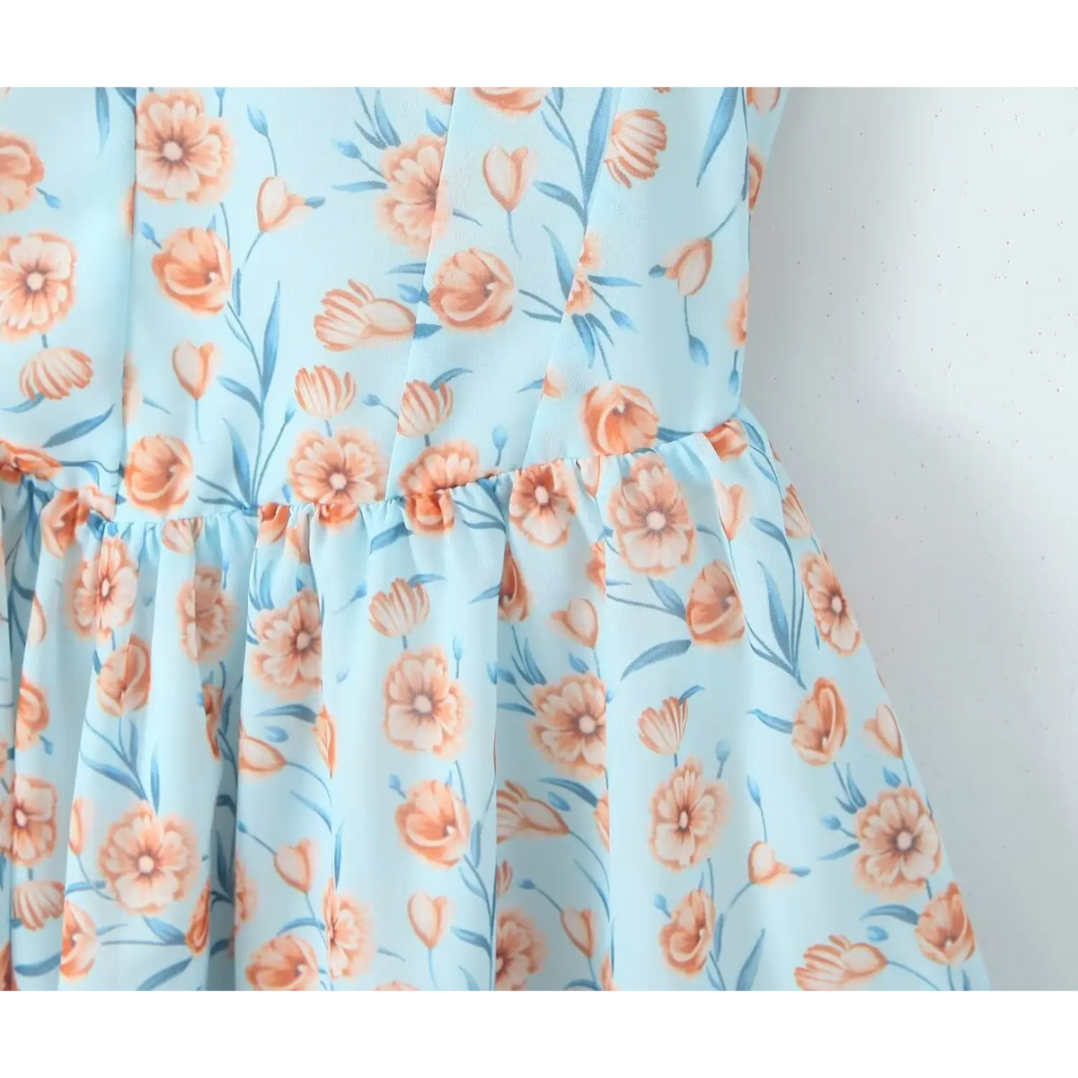Close-up of fitted waist and ruffled seam