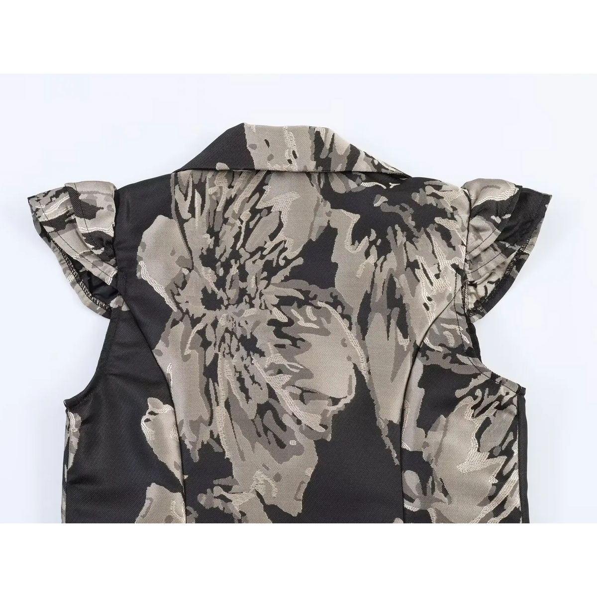 Top back view of black grey floral jacquard mini dress, showing ruffle cap sleeves, tailored back panel and lapel collar