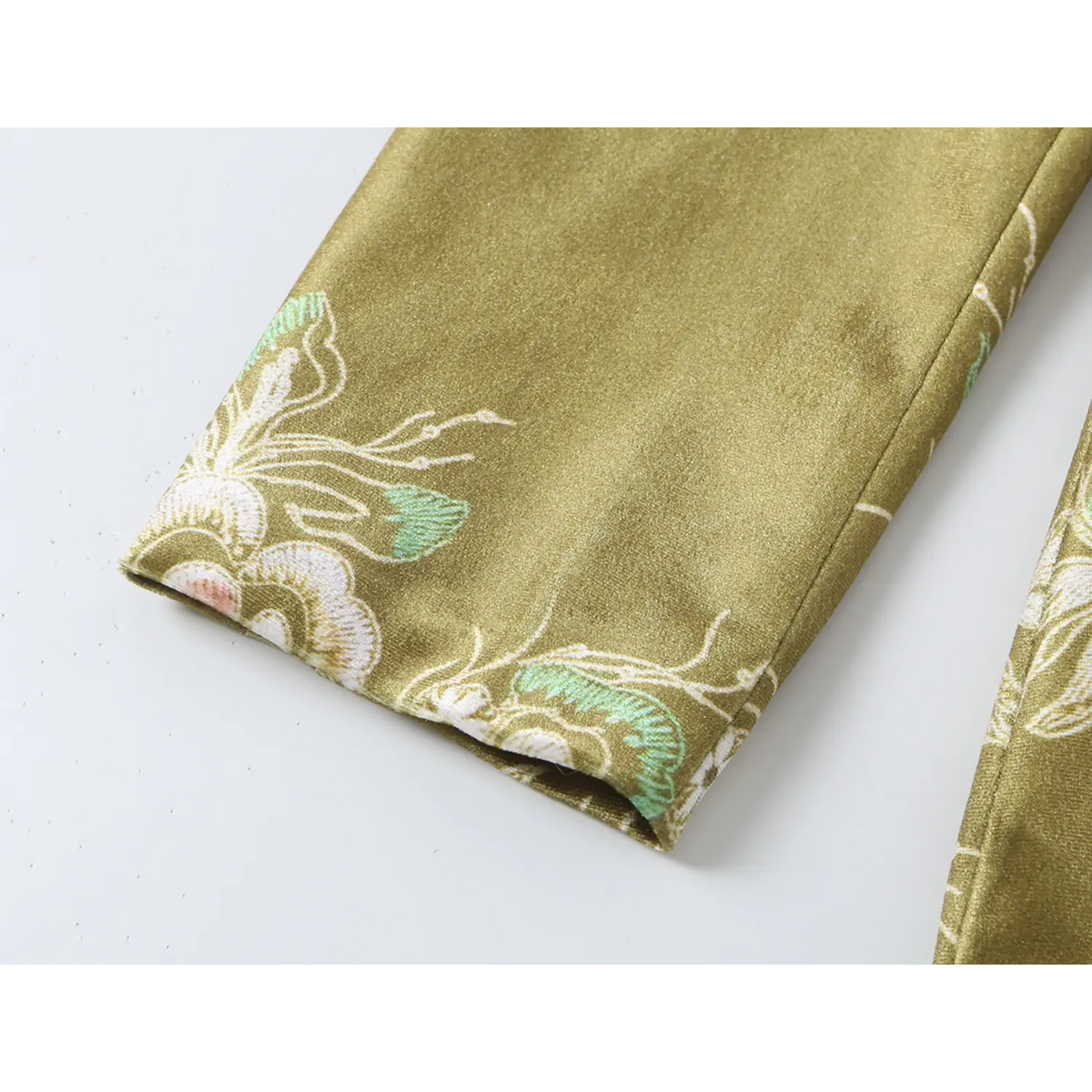 Close-up of long sleeve cuff and floral print