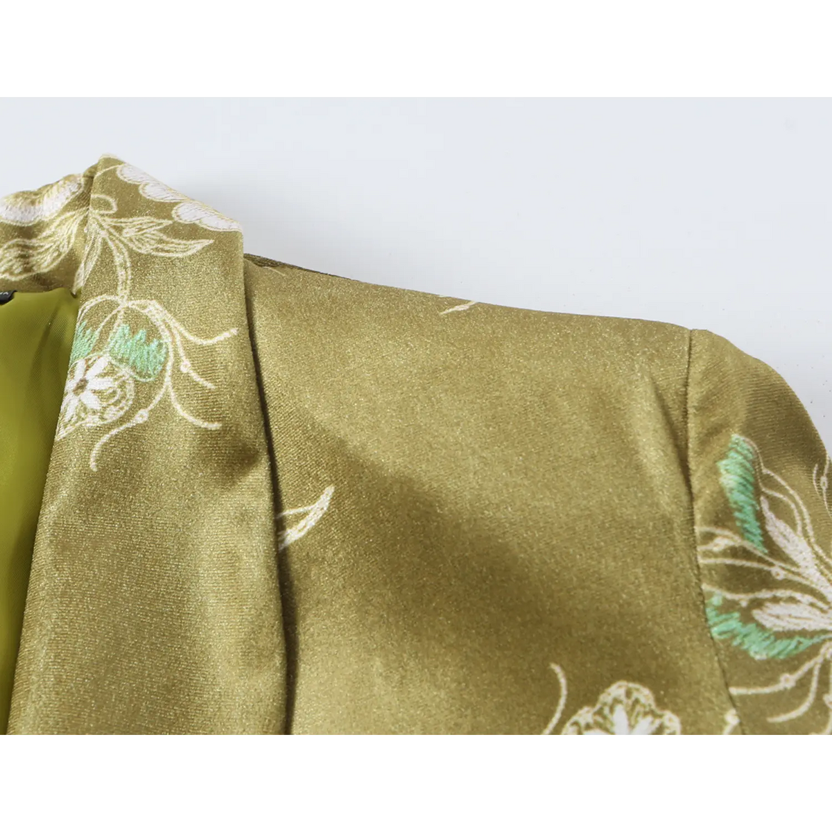 Close-up of shoulder seam and floral fabric