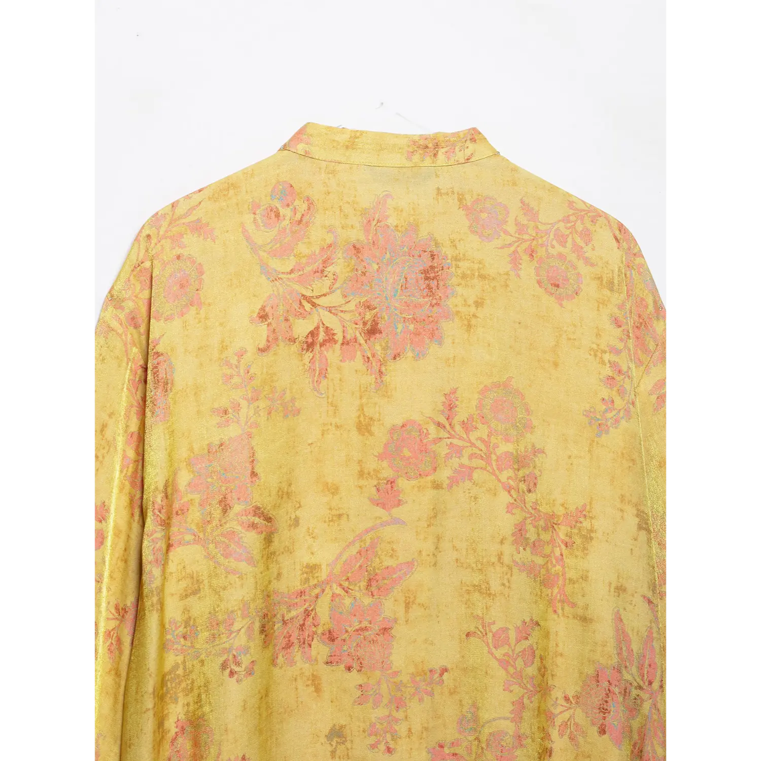 Rear fabric closeup, distressed vintage floral pattern on yellow traditional chinese blouse