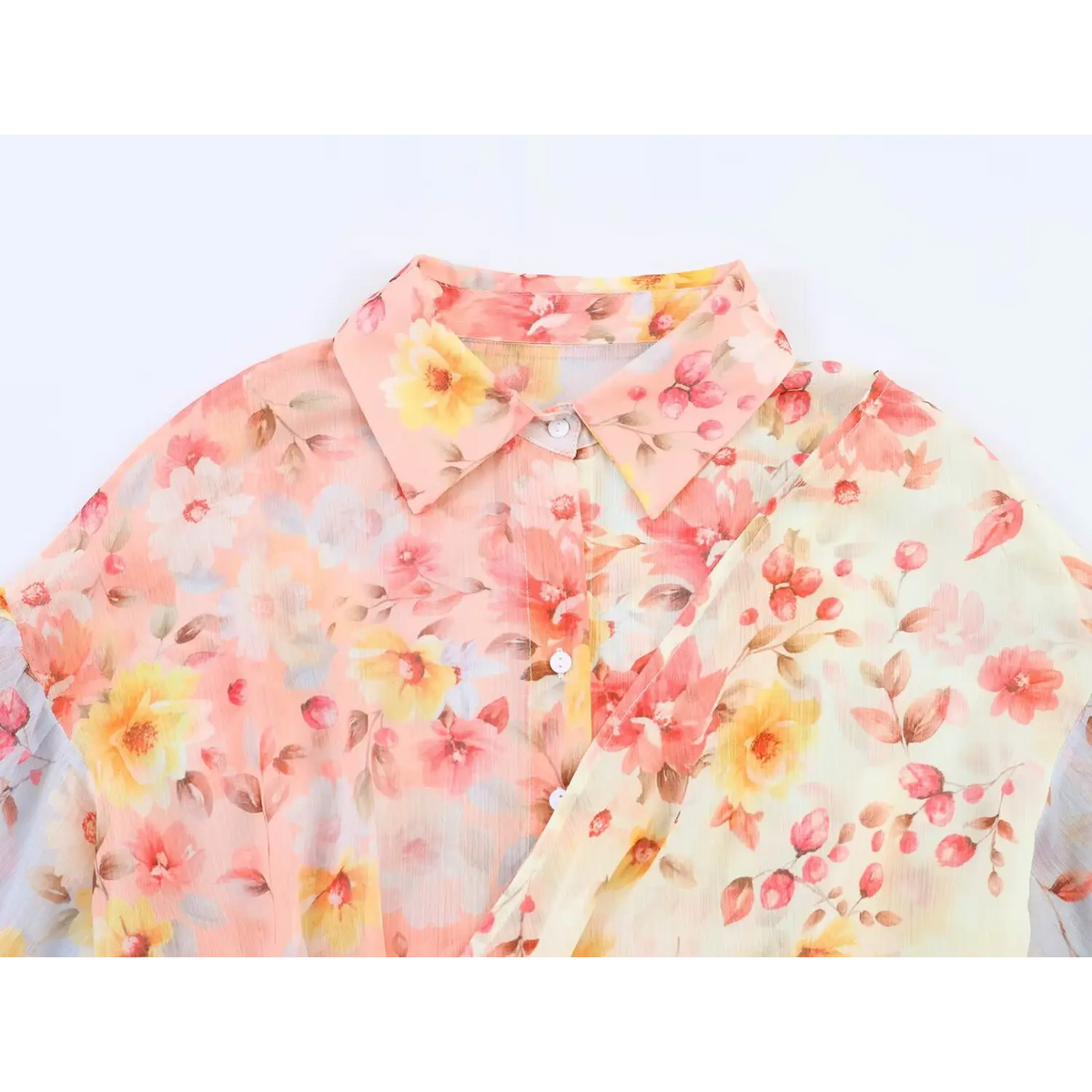 Close‑up of collared neckline and front button detail on watercolor floral maxi dress