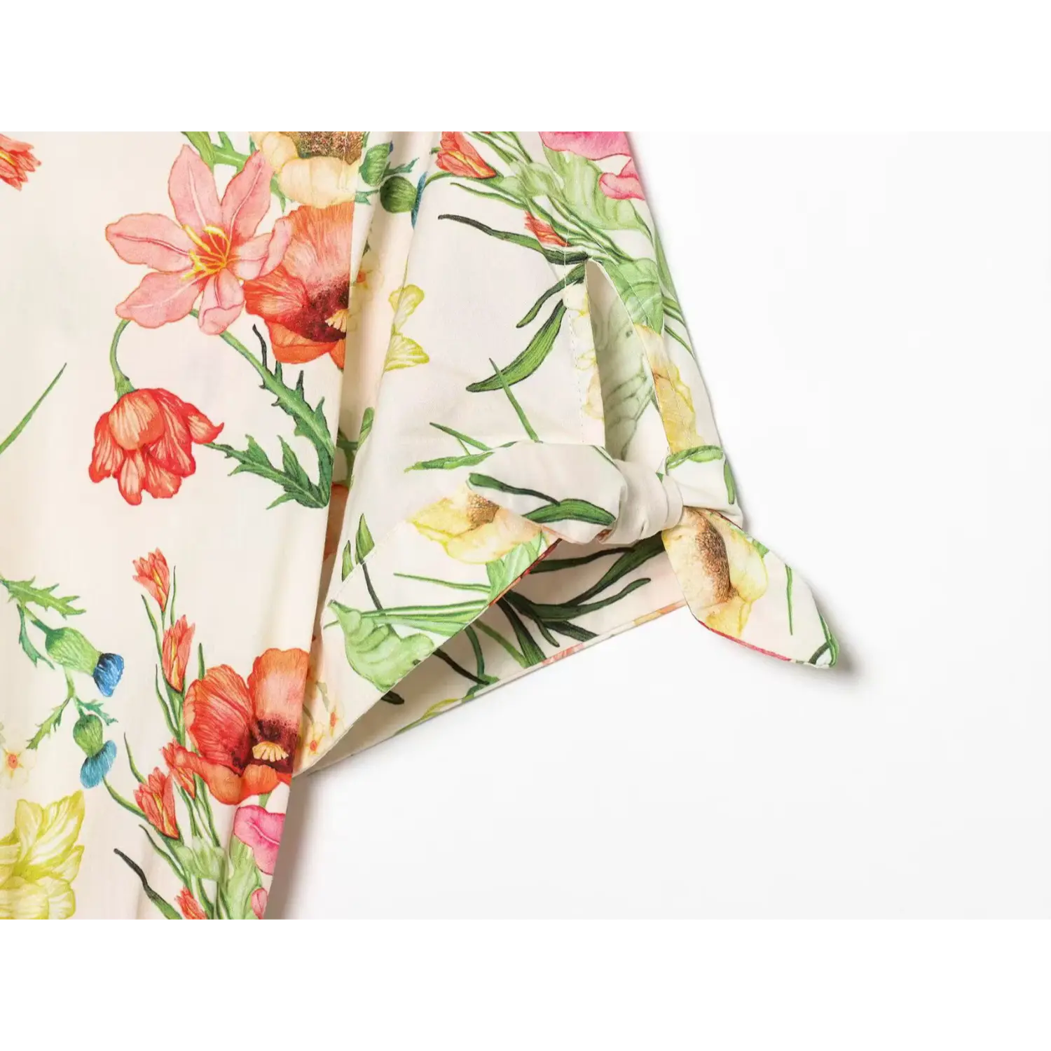 Close up of short tie sleeve detail on cream watercolor floral shirt midi dress