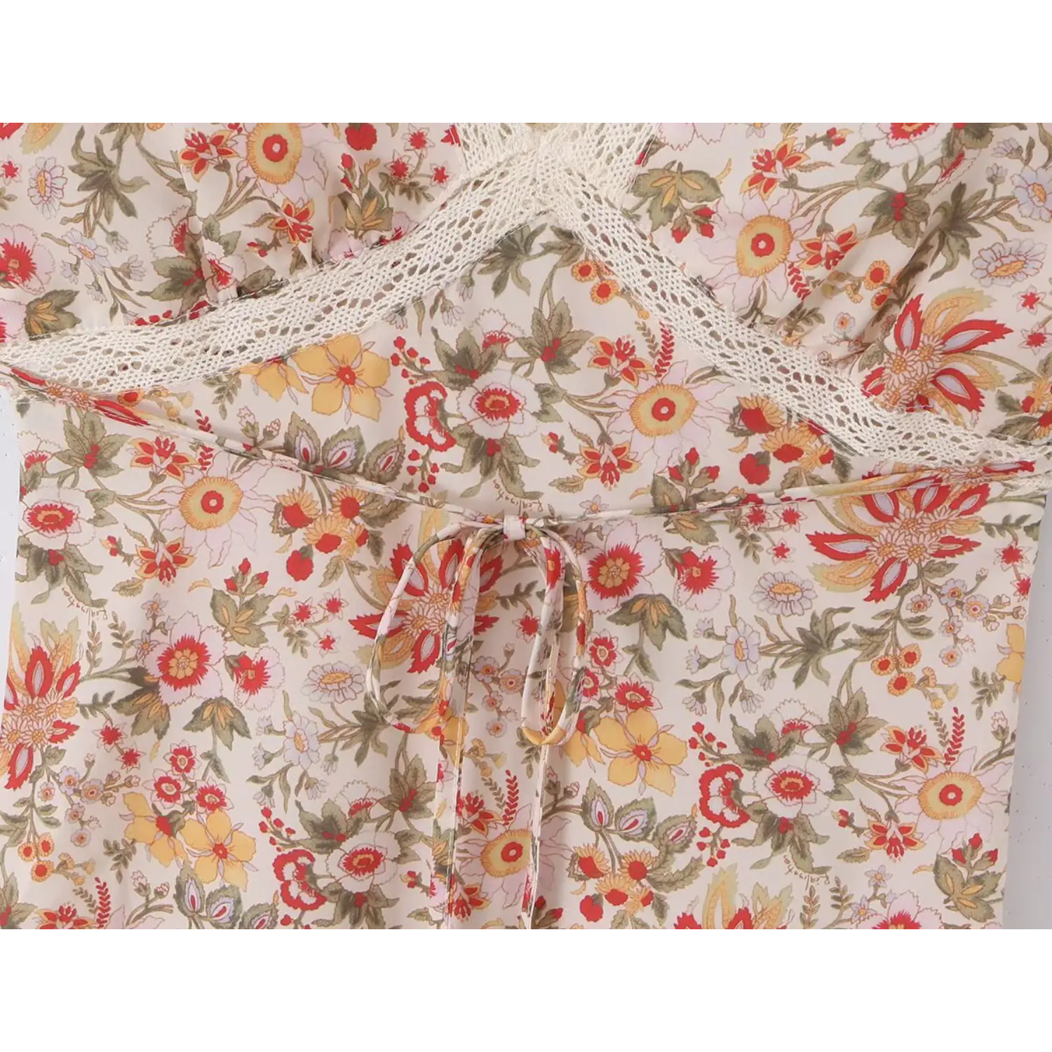 Close up adjustable self fabric waist tie bow back, matching vintage floral print, lace wrap v neck mini dress