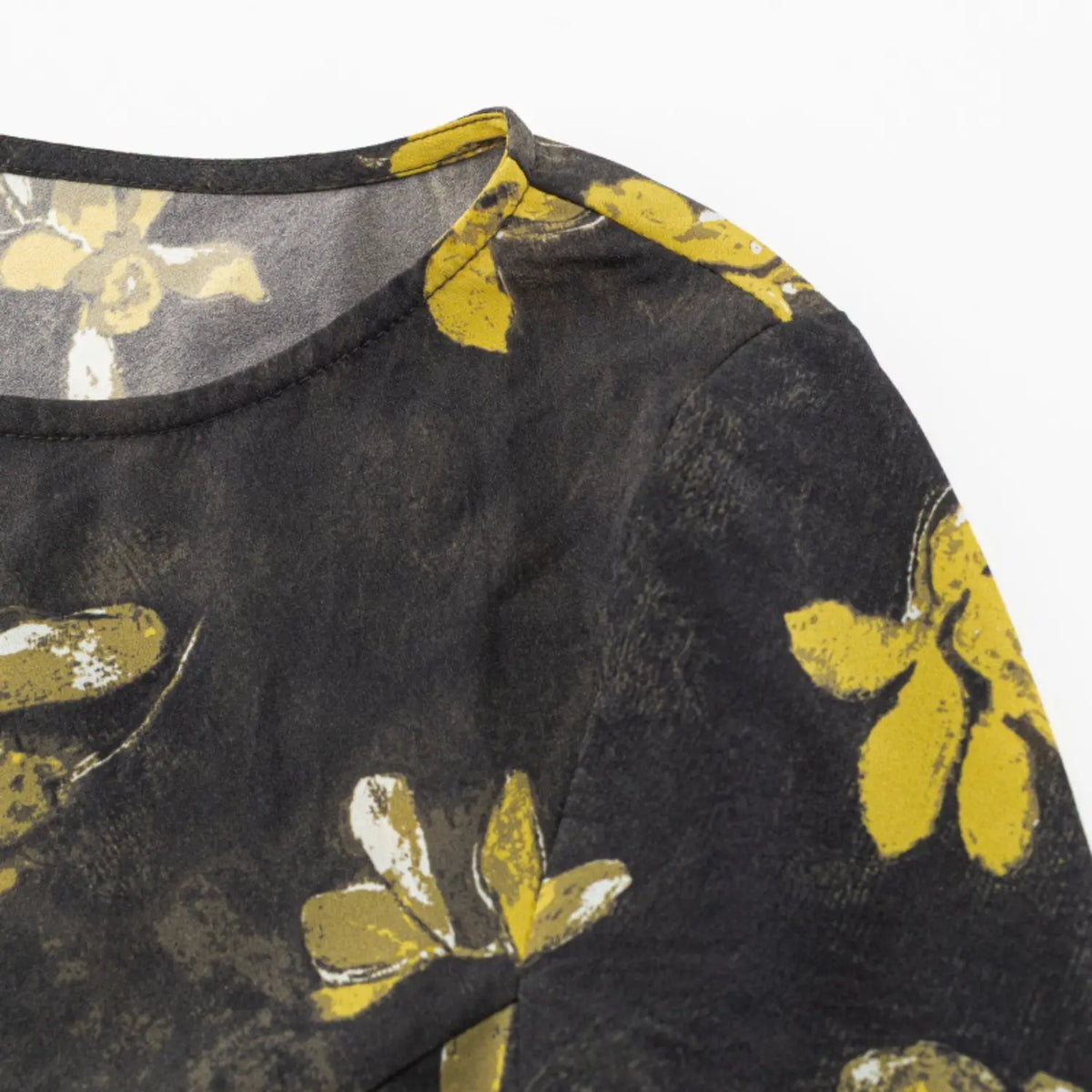 Close-up of shoulder and neckline