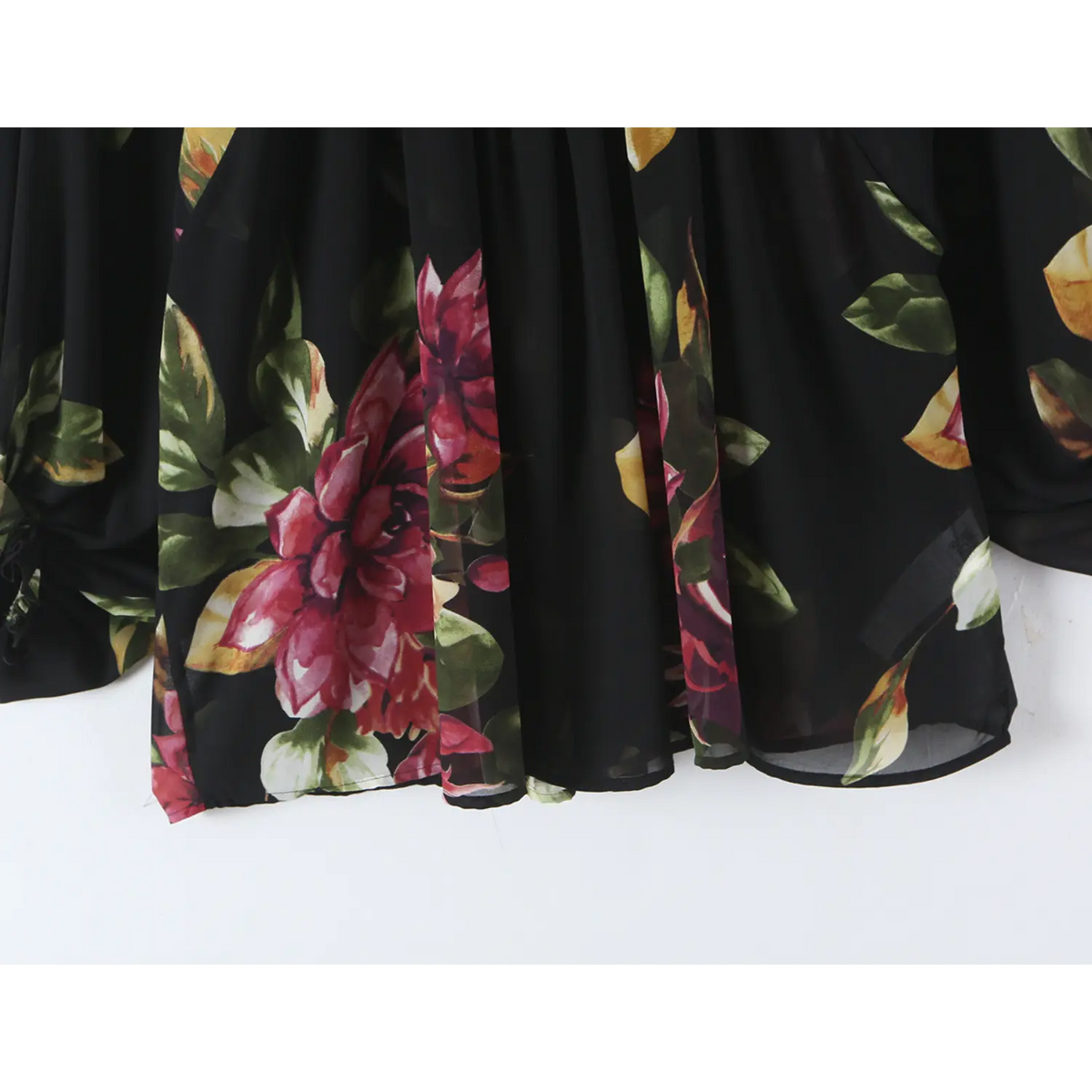 Close-up of flowy chiffon hem