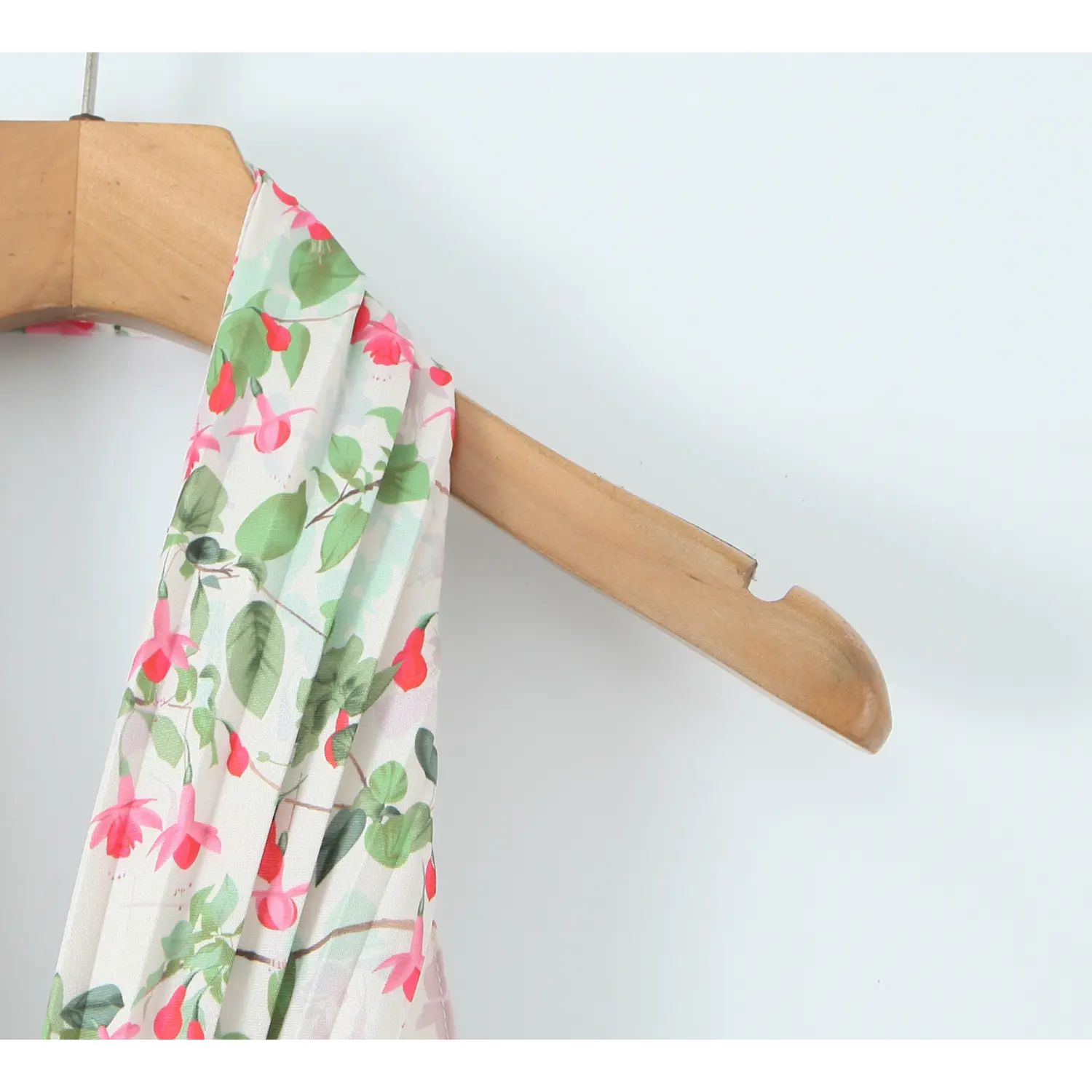 Close-up long halter fabric band, clear watercolor fuchsia floral pattern, soft lightweight woven drape