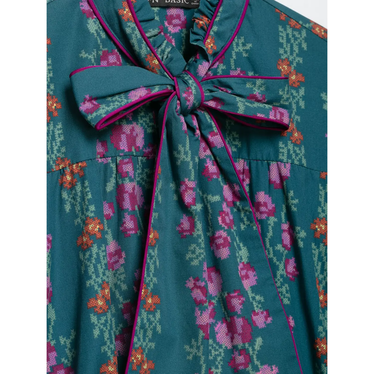 Close-up of tie bow detail