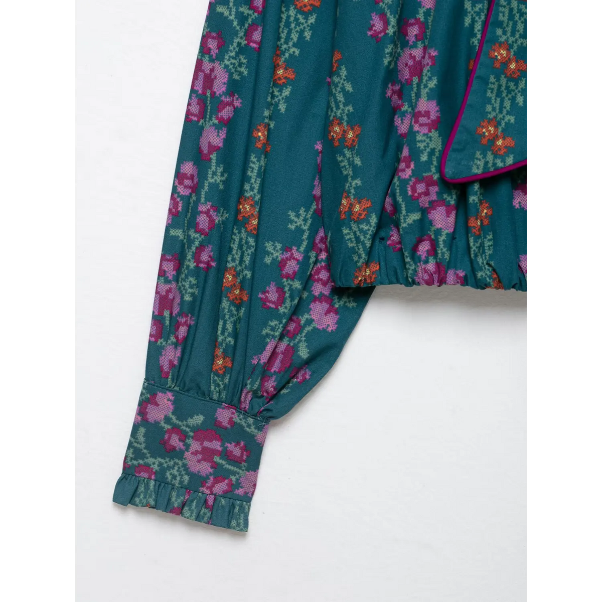 Close-up of lantern sleeve and ruffle cuff