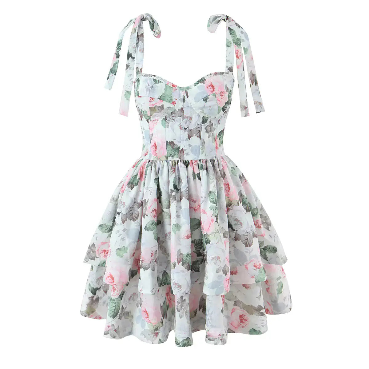 Studio shot of a floral print corset mini dress with sweetheart neckline, tie straps, and tiered skirt.