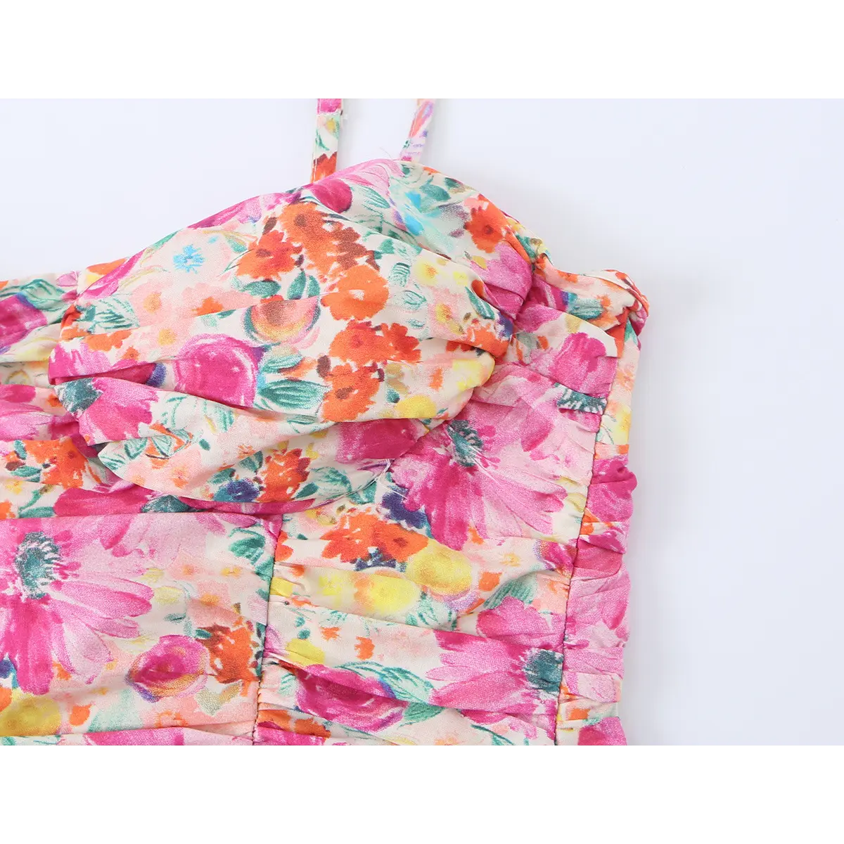 Close-up of the dress's bust, showcasing the sweetheart design and gathered fabric detail.
