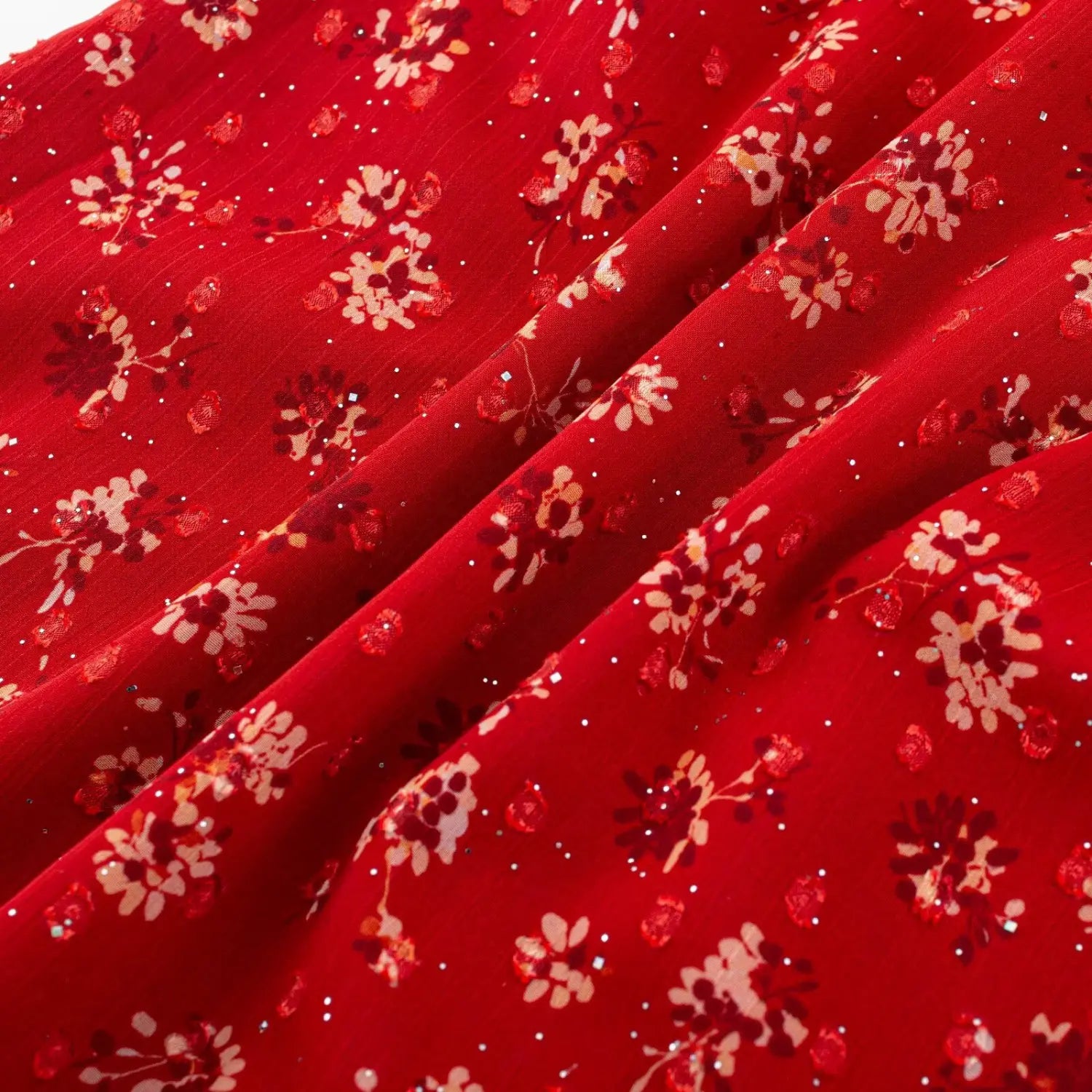 Dress floral sparkle fabric wrinkle flat shot, red base mini flower with silver tiny sparkle textured chiffon lightweight breathable clear print fabric shot