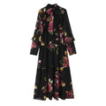 Front flat lay of floral tie neck ruffle tiered maxi dress
