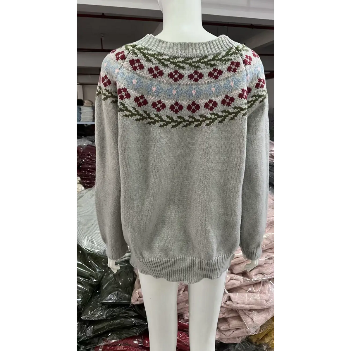 Back view of floral yoke fair isle knit sweater on mannequin
