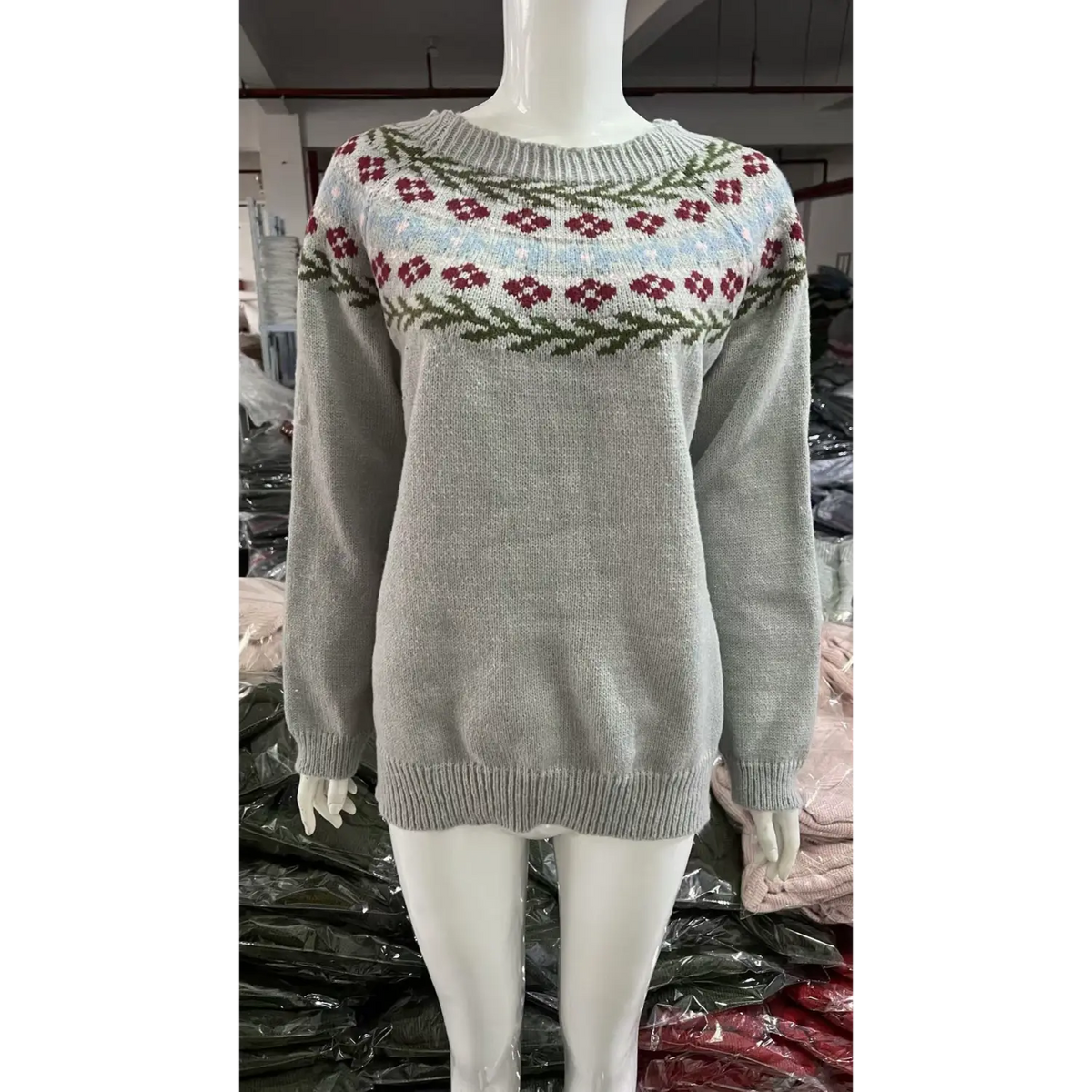 Front view of floral yoke fair isle knit sweater on mannequin