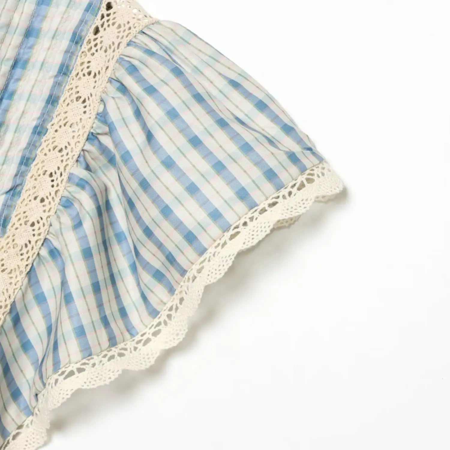 Sleeve detail, gathered flutter short sleeve finished with cream scalloped lace trim