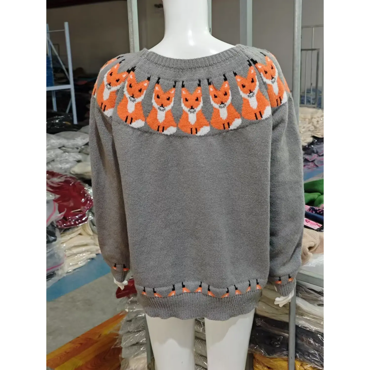 Back view of fox yoke intarsia crew neck knit sweater on mannequin