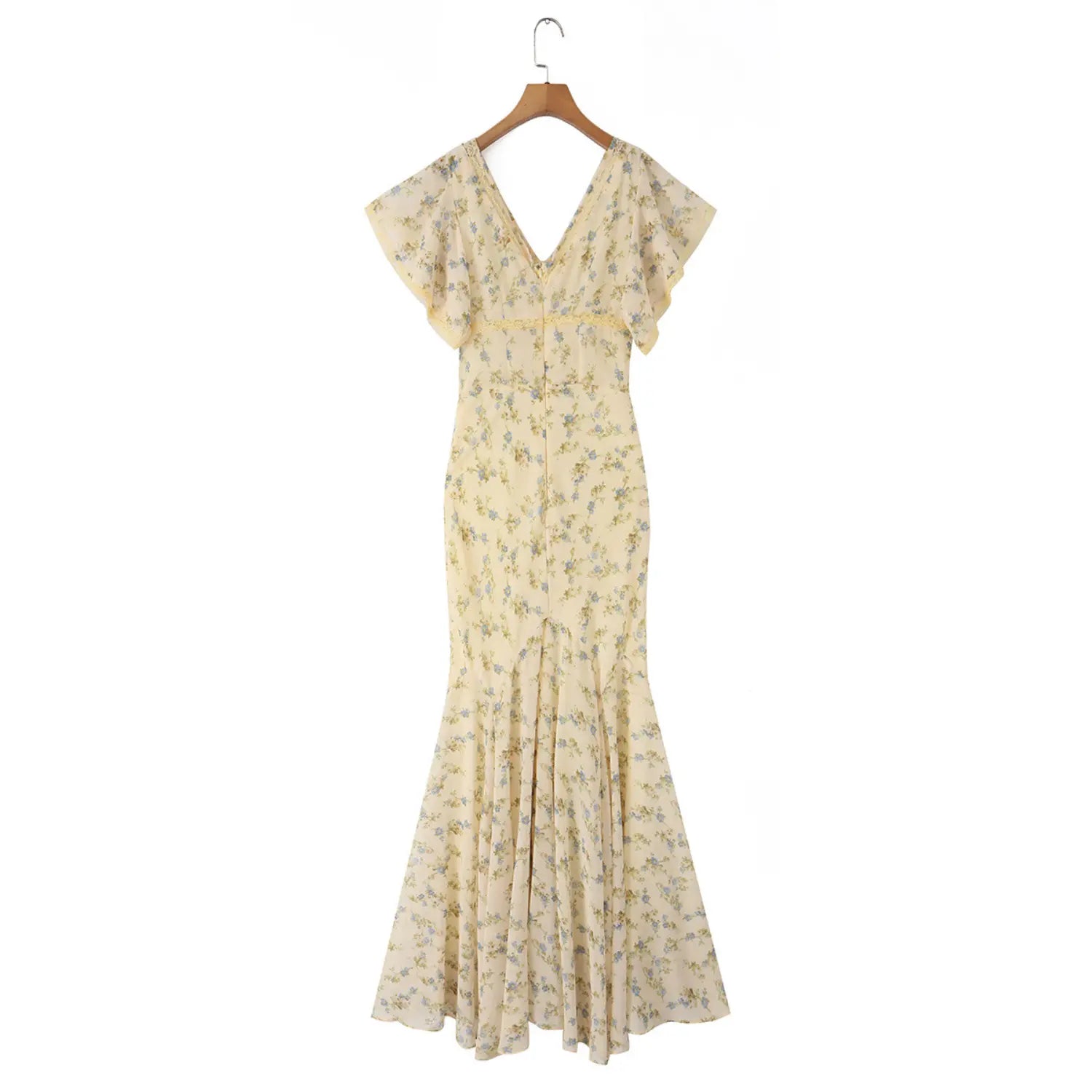 Full back hanging shot of cream chiffon mermaid maxi dress with blue small floral print, lace v-neck tie bust flutter sleeves for spring outdoor outing
