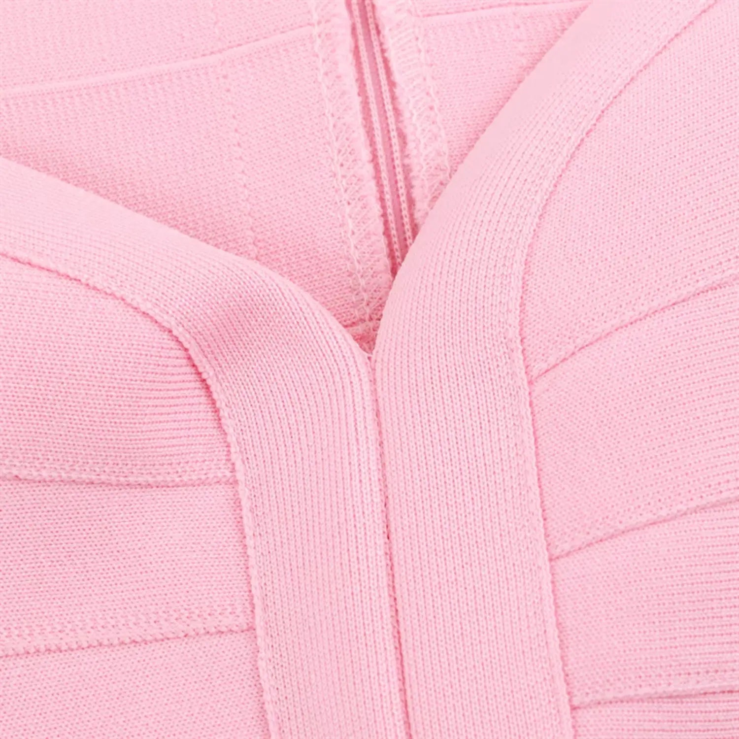Mid front torso close-up, vertical central shaping bandage strip, intersecting horizontal panel seams for waist cinching