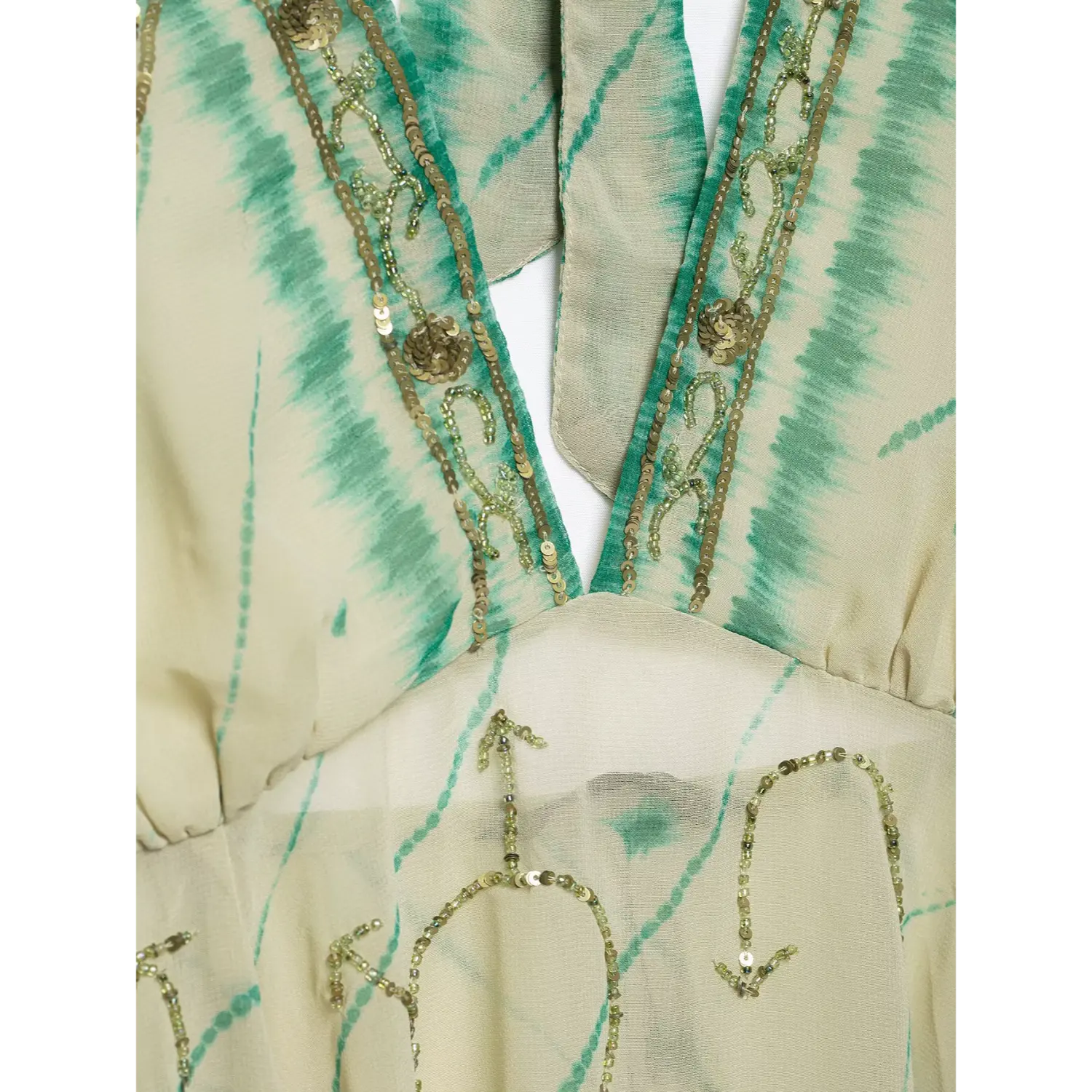 Deep V neckline seam detail, hand-sewn golden flower sequin & bead border, crinkle chiffon texture