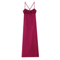 Front view isolated white background, fuchsia spaghetti strap maxi dress with bust tie detail