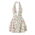 Front full product shot, wrap halter tie neck, ultra deep plunge V cutout, fitted corset waist, heavily gathered A-line mini skirt, off-white base with pink-red fuchsia flower print