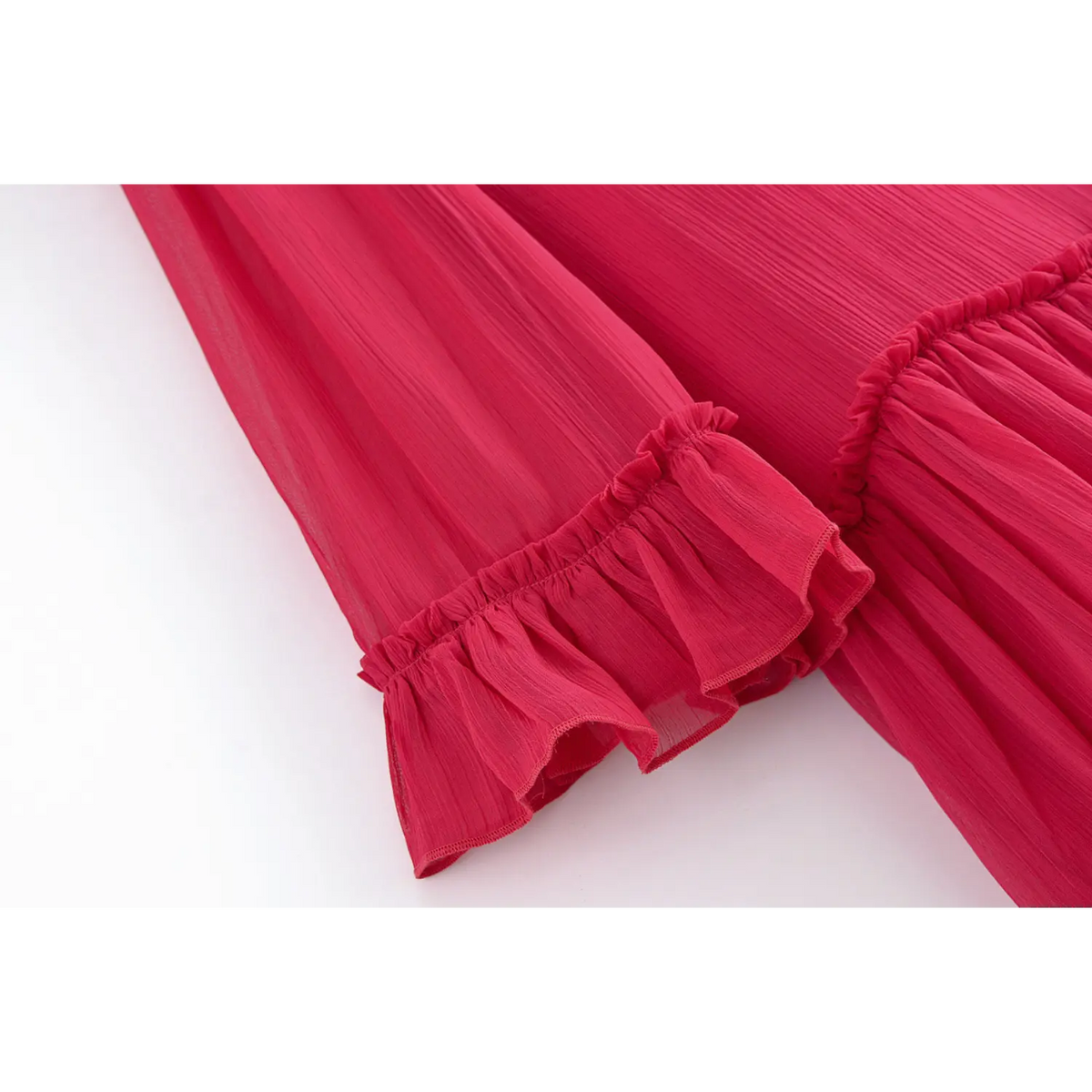 Close-up of ruffled cuff