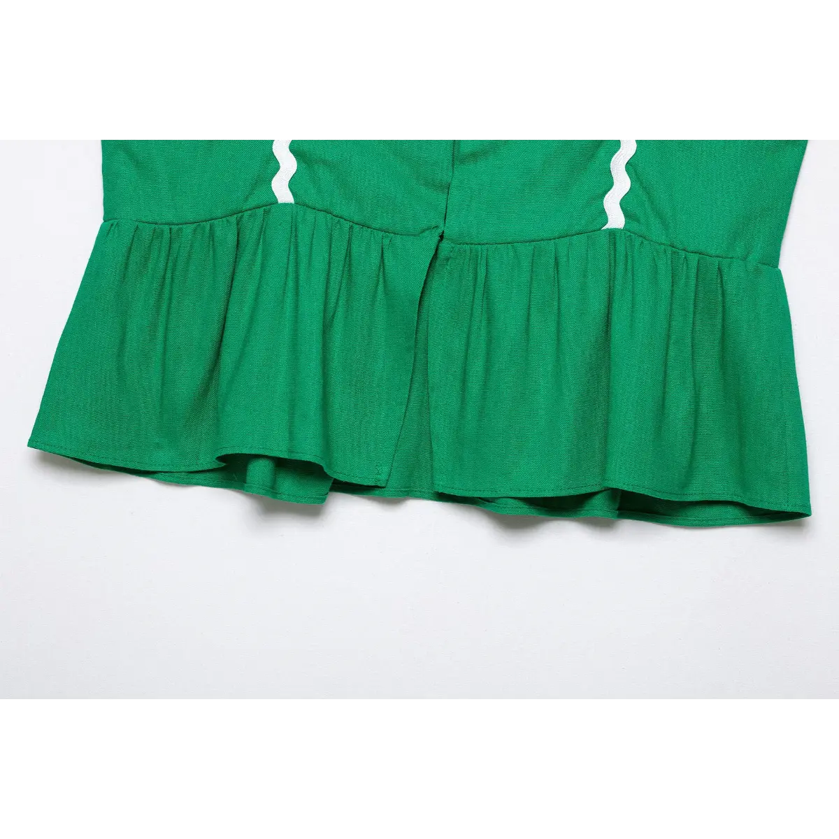 Full back view center split open back textured green sleeveless top