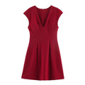 Full front view of a red V-neck cap sleeve mini dress, showcasing the structured bodice, A-line skirt, and hidden back zipper.