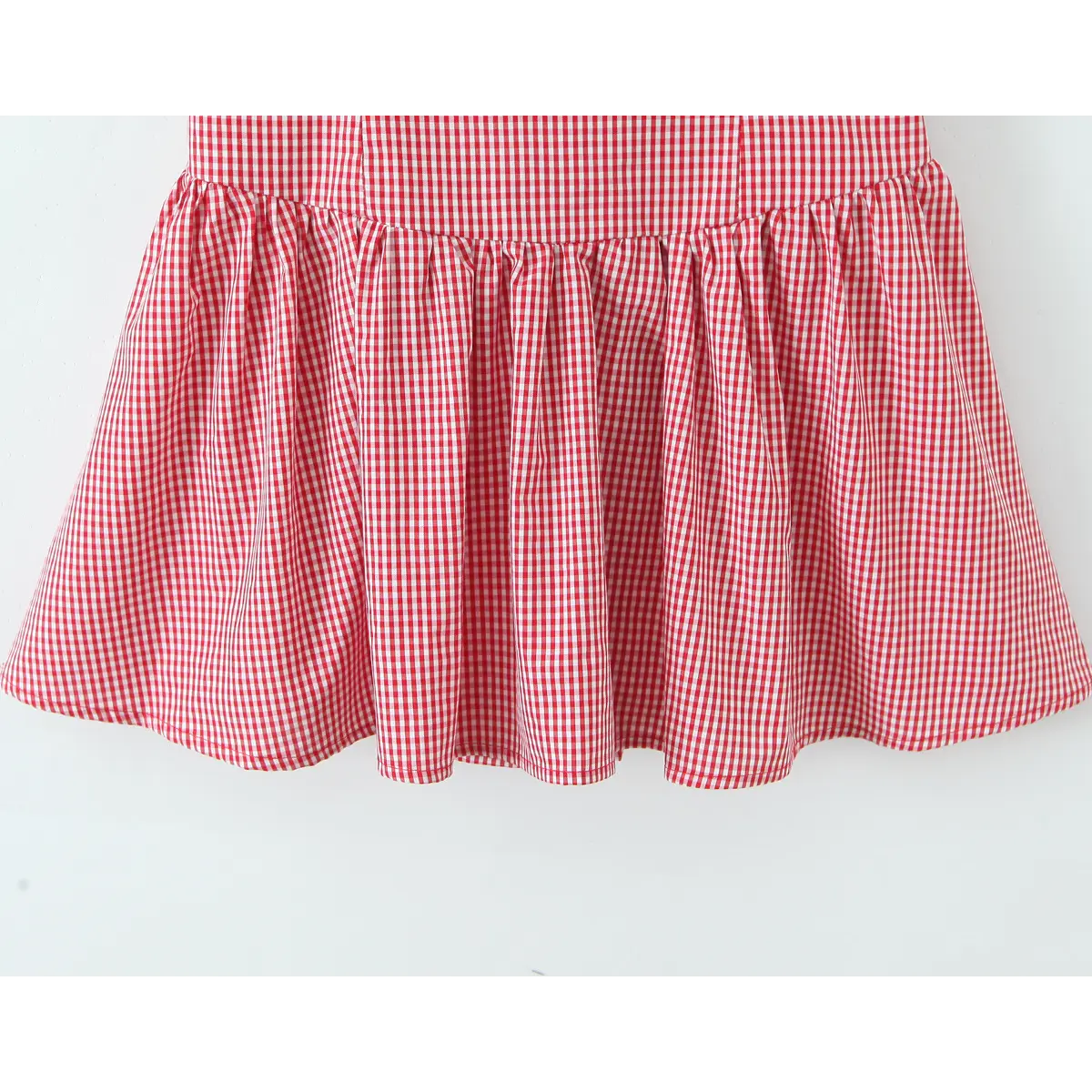 Ruffle flare skirt hem gather seam close shot